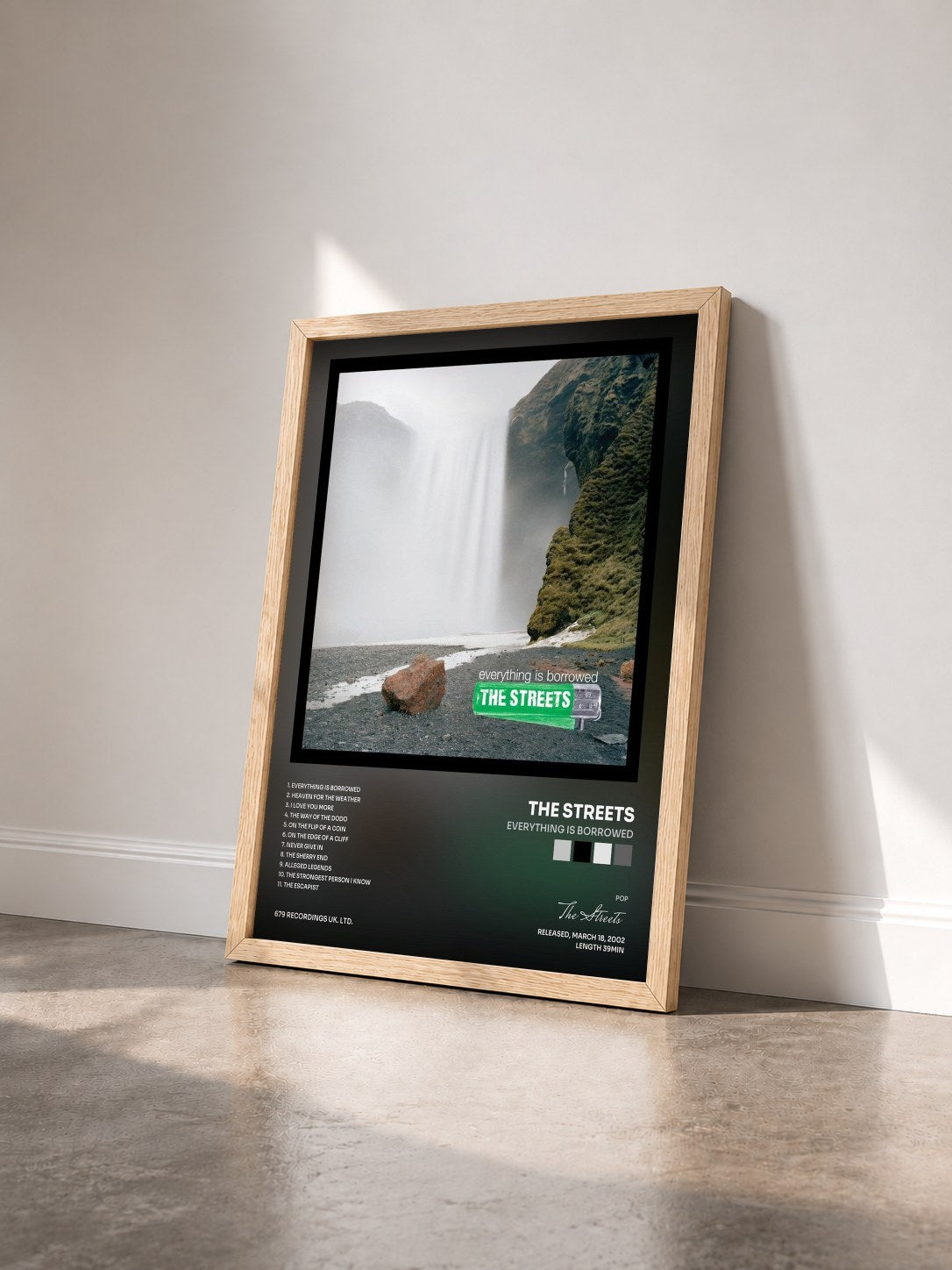 #bois Tableau de l'album Everything Is Borrowed de The Streets vu de trois quarts, cadre en bois brut