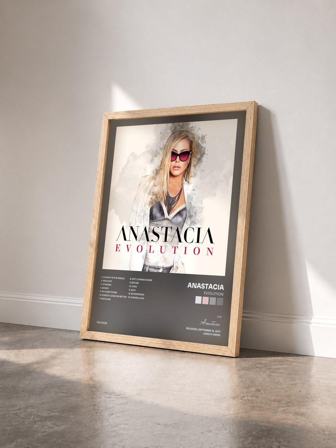 #bois Tableau de l'album Evolution de Anastacia vu de trois quarts, cadre en bois brut