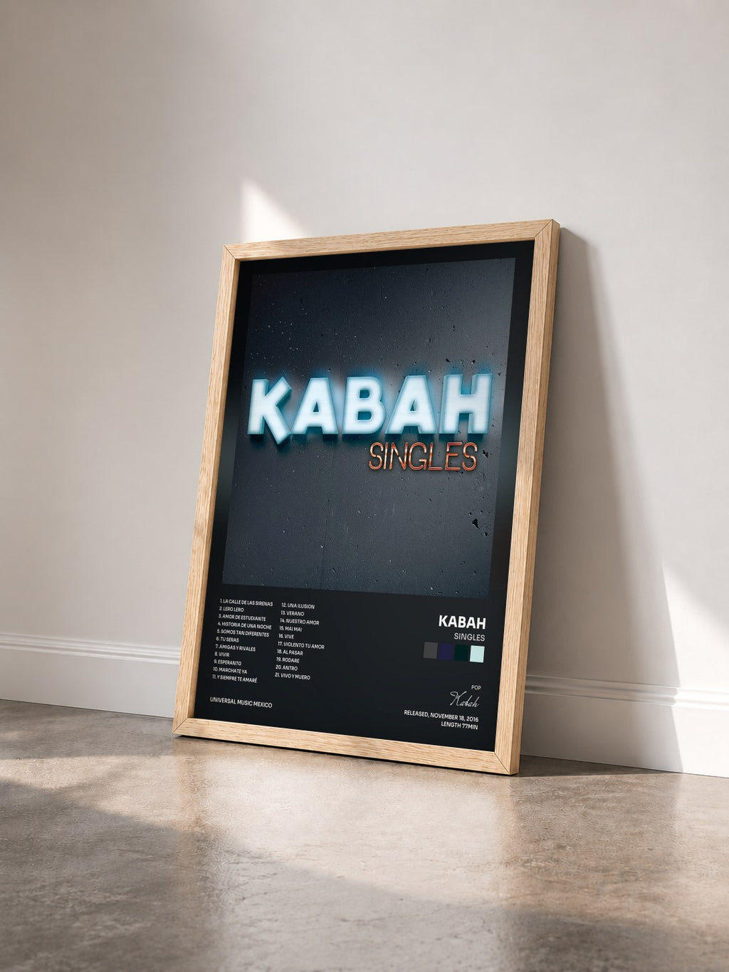 #bois Tableau de l'album Singles de Kabah vu de trois quarts, cadre en bois brut