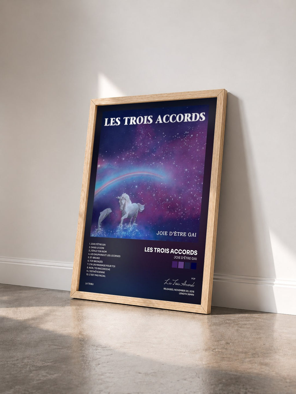 #bois Tableau de l'album Joie d'être gai de Les Trois Accords vu de trois quarts, cadre en bois brut
