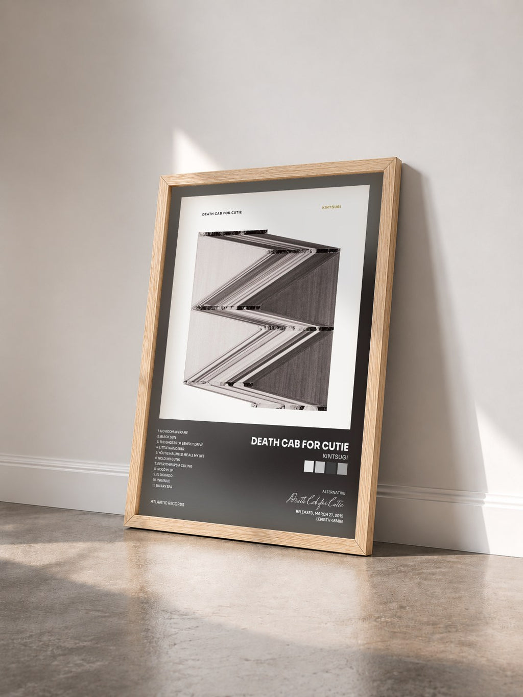 #bois Tableau de l'album Kintsugi de Death Cab for Cutie vu de trois quarts, cadre en bois brut