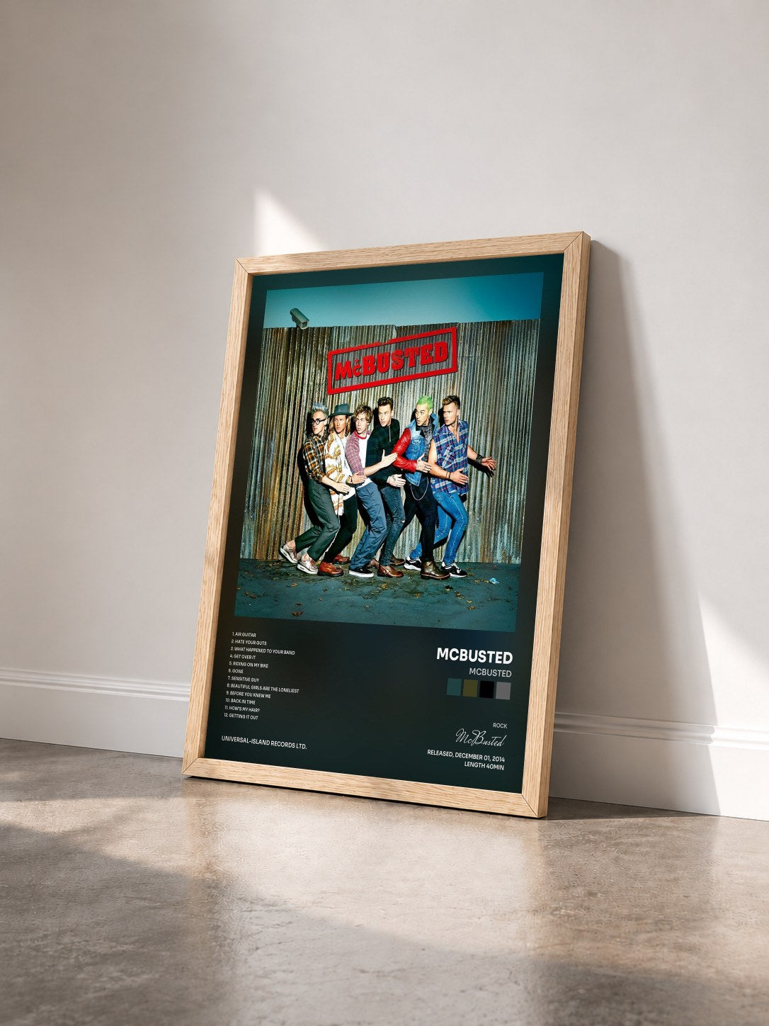 #bois Tableau de l'album McBusted de McBusted vu de trois quarts, cadre en bois brut