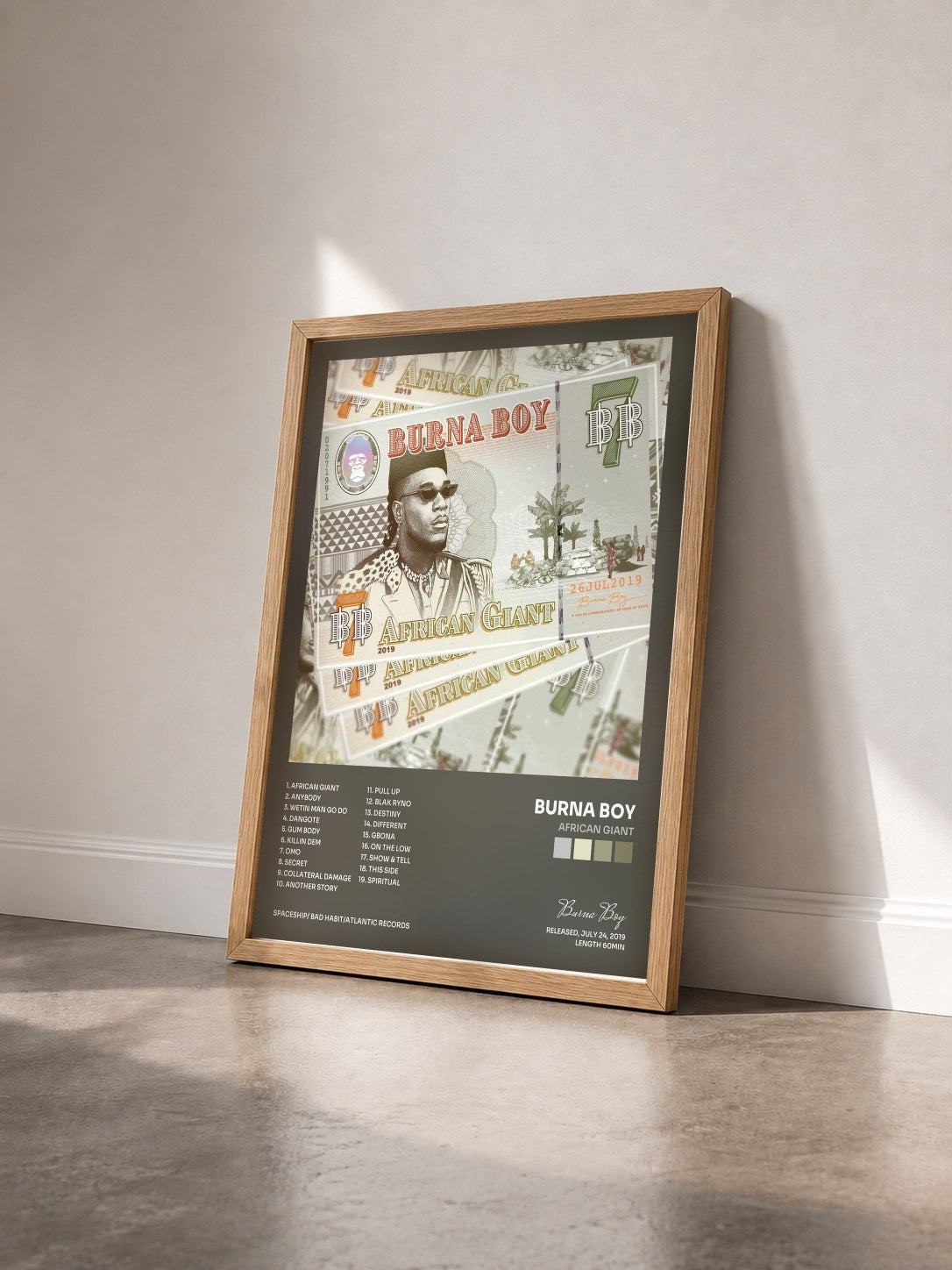 #bois Tableau de l'album African Giant de Burna Boy vu de trois quarts, cadre en bois brut