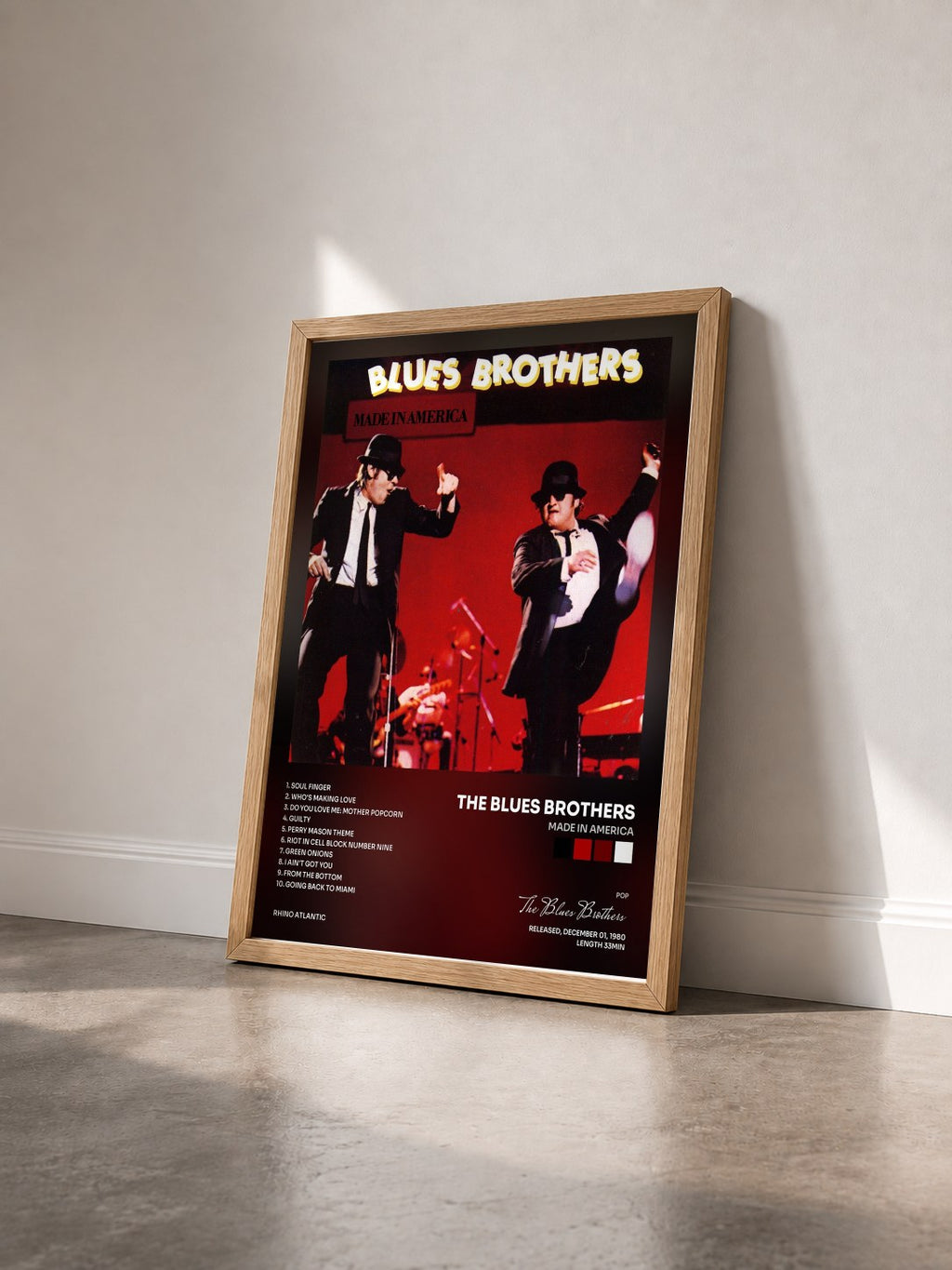 #bois Tableau de l'album Made in America de The Blues Brothers vu de trois quarts, cadre en bois brut