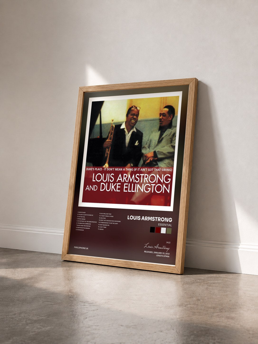 #bois Tableau de l'album Essential de Louis Armstrong vu de trois quarts, cadre en bois brut