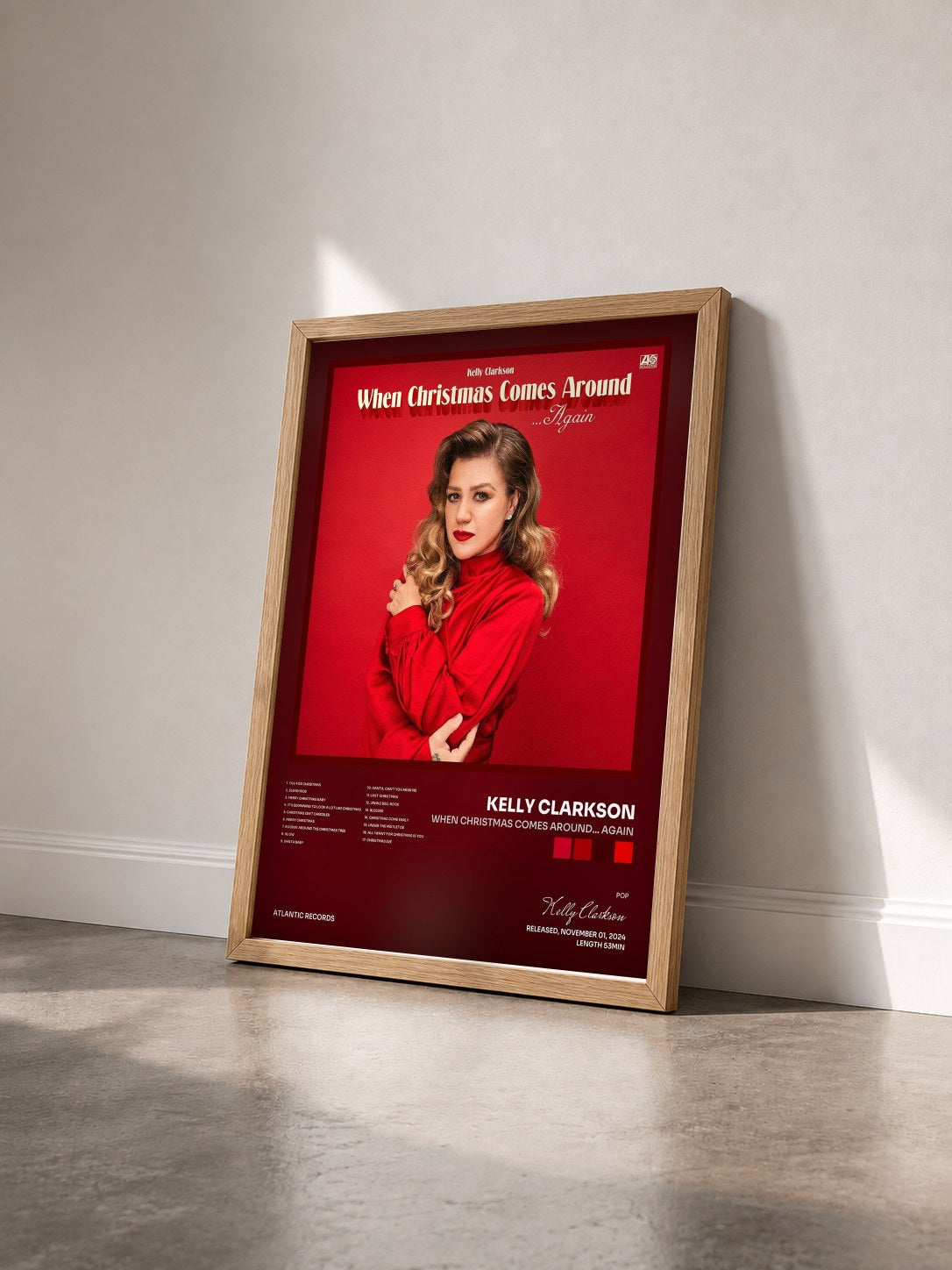 #bois Tableau de l'album When Christmas Comes Around… Again de Kelly Clarkson vu de trois quarts, cadre en bois brut