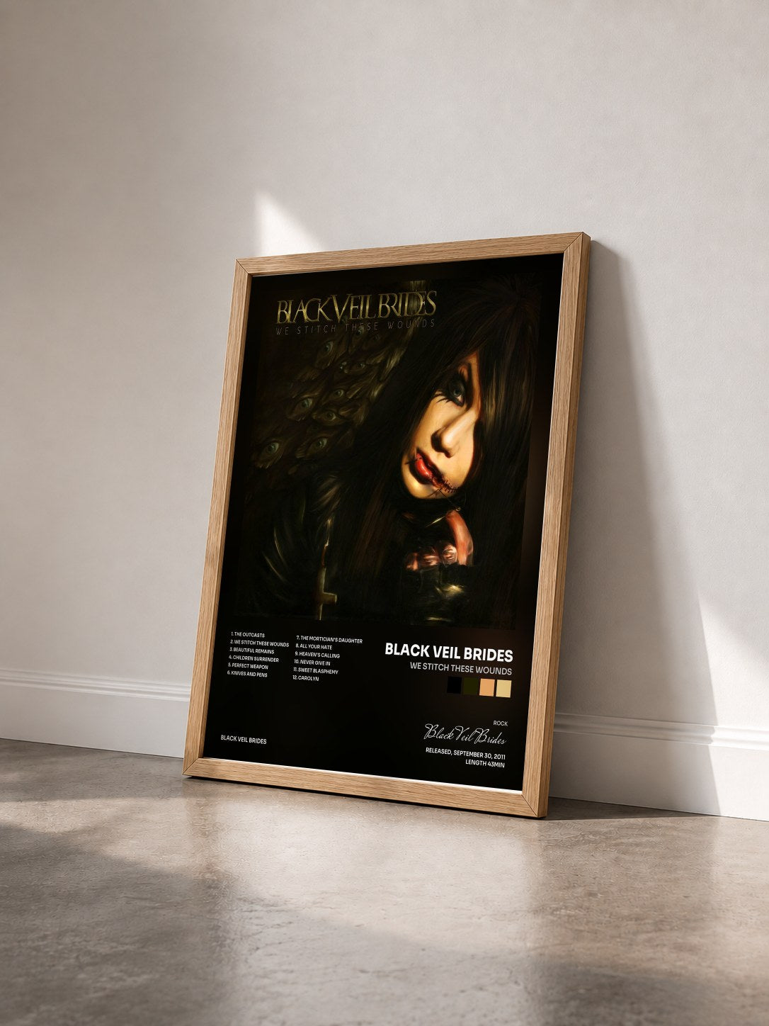 #bois Tableau de l'album We Stitch These Wounds de Black Veil Brides vu de trois quarts, cadre en bois brut
