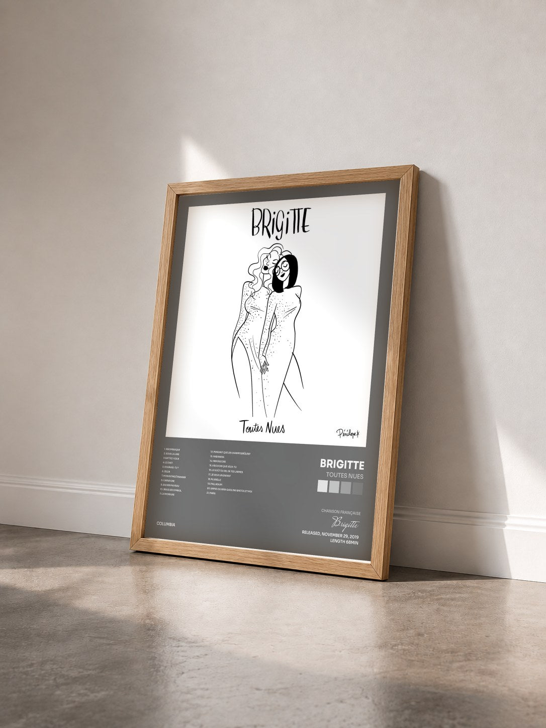 #bois Tableau de l'album Toutes nues de Brigitte vu de trois quarts, cadre en bois brut