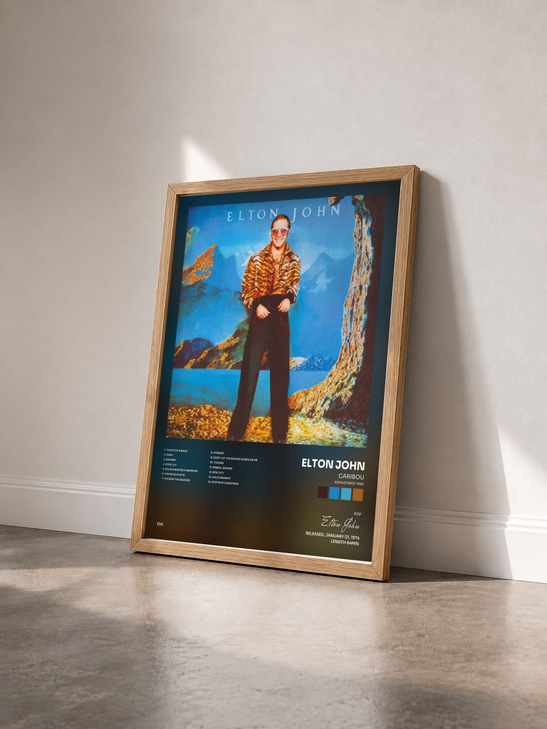 #bois Tableau de l'album Caribou (Remastered 1995) de Elton John vu de trois quarts, cadre en bois brut