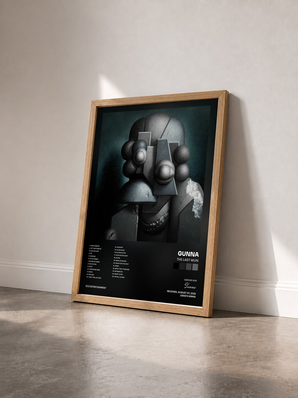 #bois Tableau de l'album The Last Wun de Gunna vu de trois quarts, cadre en bois brut
