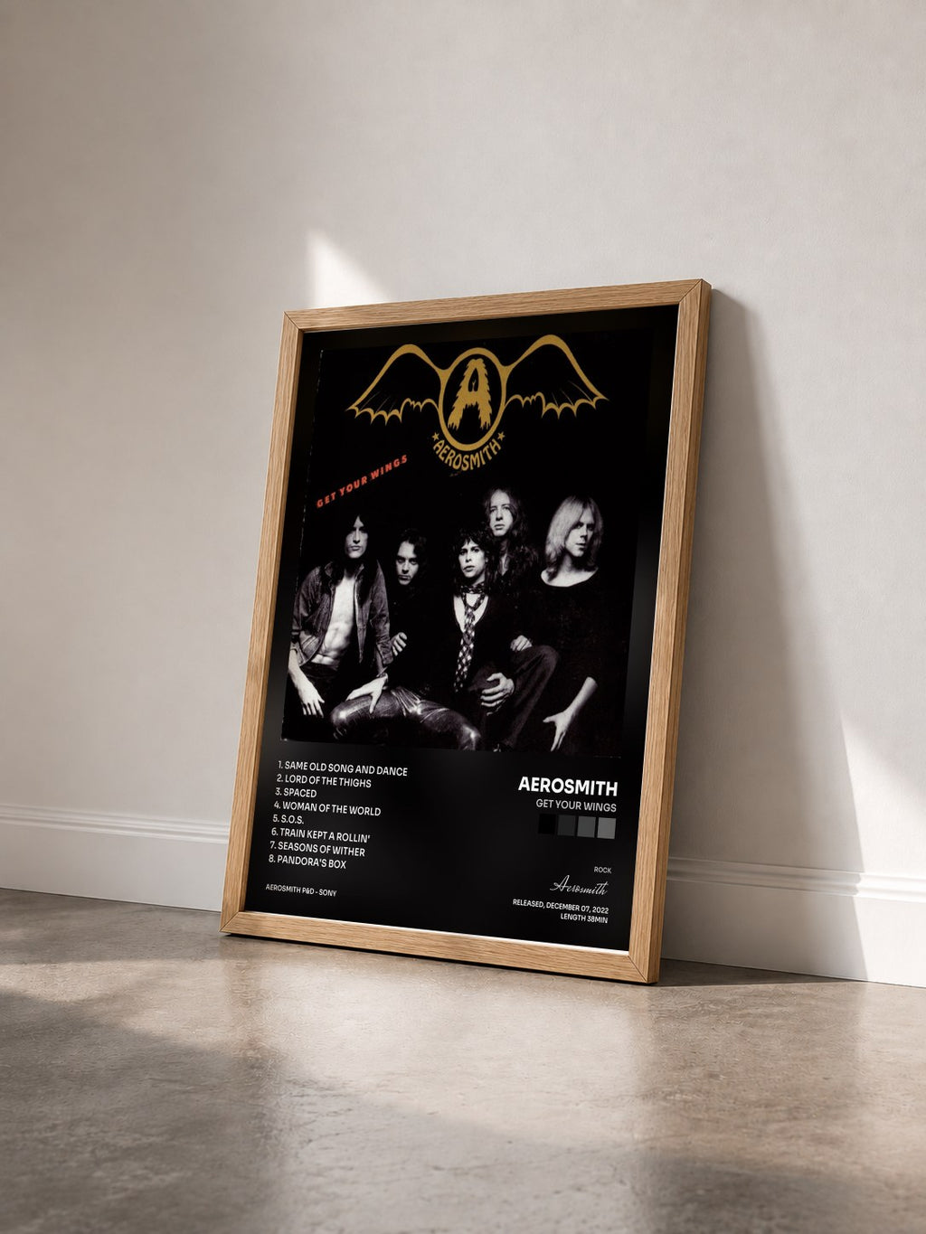 #bois Tableau de l'album Get Your Wings de Aerosmith vu de trois quarts, cadre en bois brut