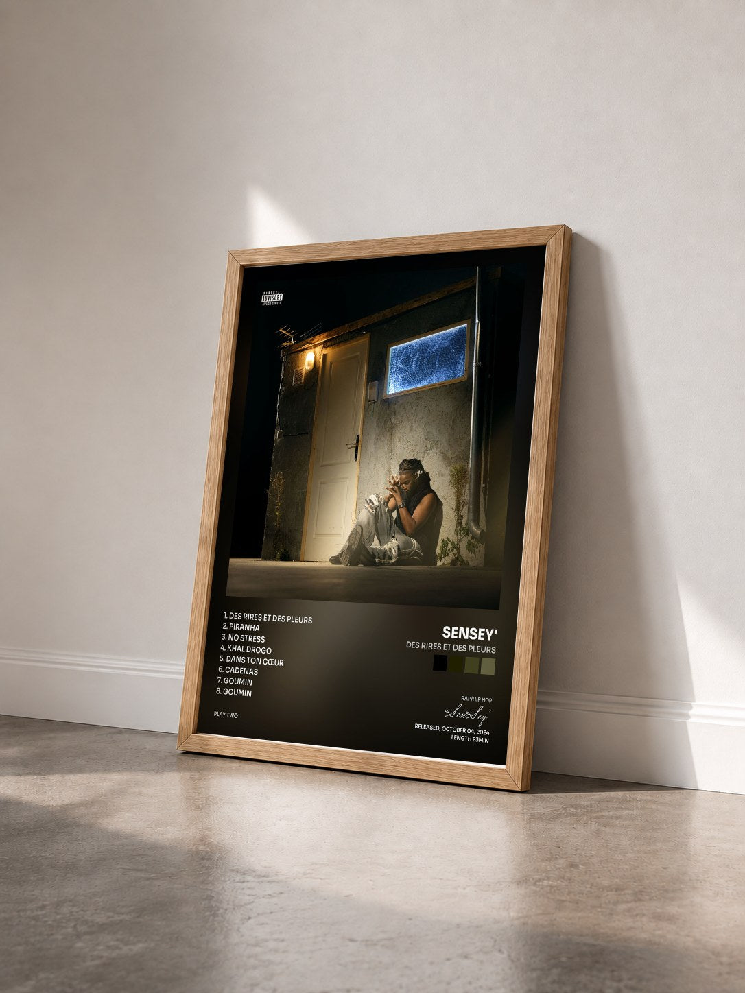 #bois Tableau de l'album Des rires et des pleurs de SenSey' vu de trois quarts, cadre en bois brut