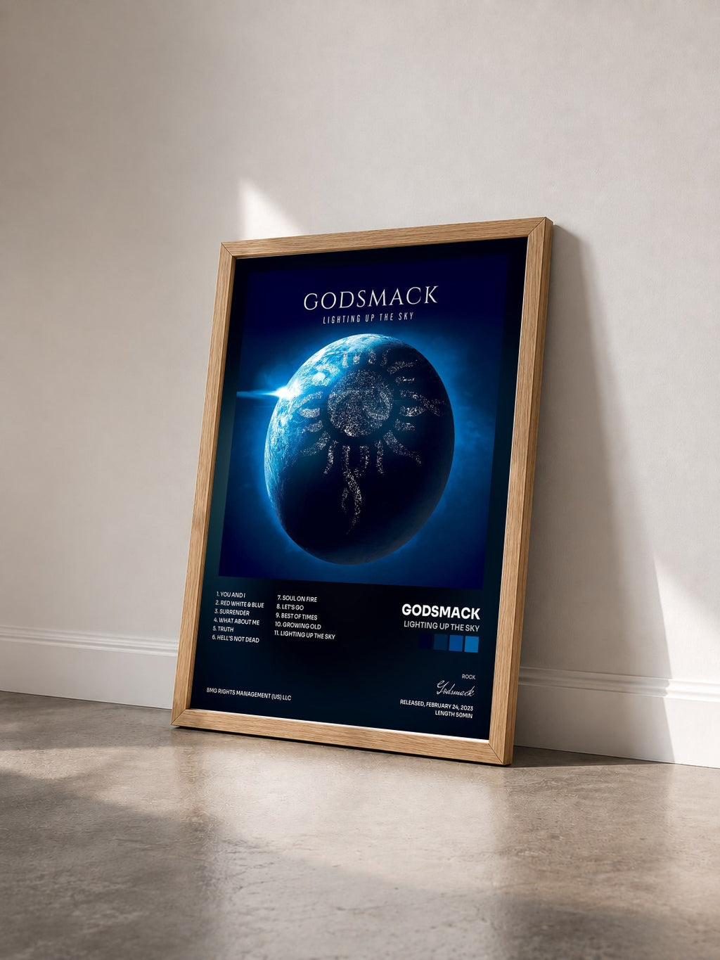 #bois Tableau de l'album Lighting Up The Sky de Godsmack vu de trois quarts, cadre en bois brut