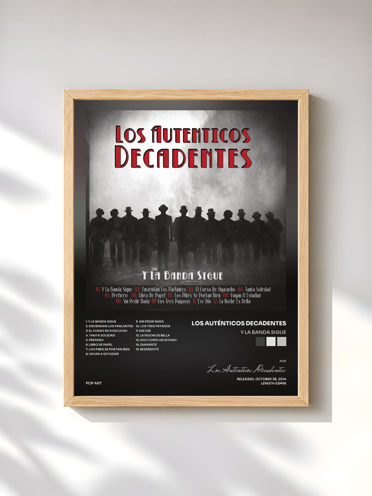 #bois Tableau de l'album Y la Banda Sigue de Los Auténticos Decadentes, cadre en bois brut, imprimé et encadré en France