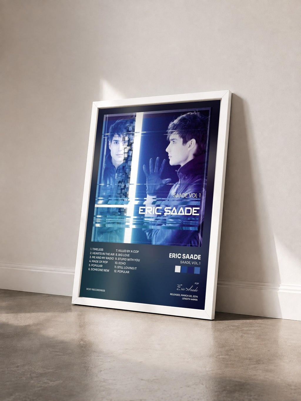 #blanc Tableau de l'album Saade, Vol. 1 de Eric Saade vu de trois quarts, cadre blanc