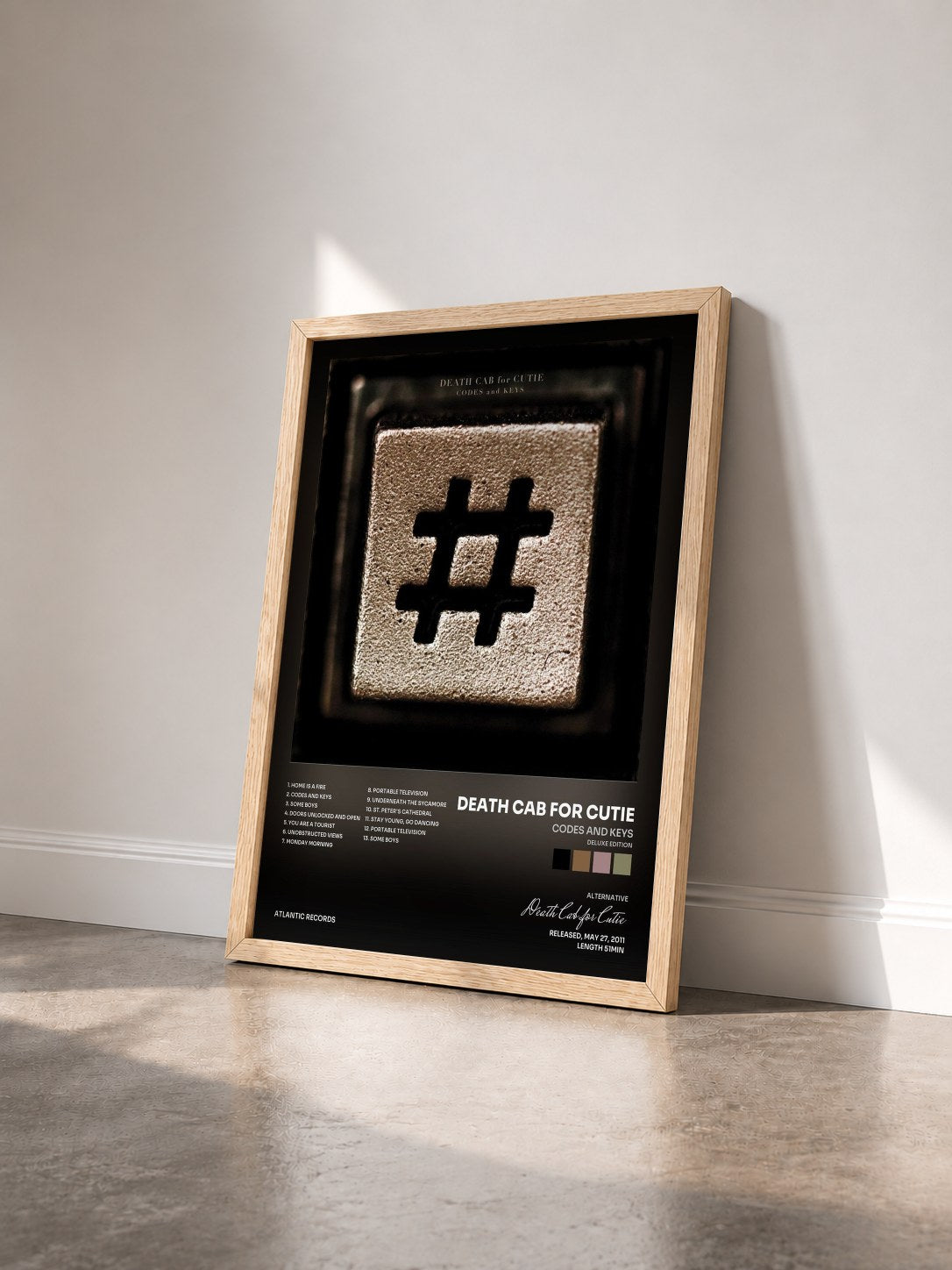 #bois Tableau de l'album Codes and Keys (Deluxe Edition) de Death Cab for Cutie vu de trois quarts, cadre en bois brut