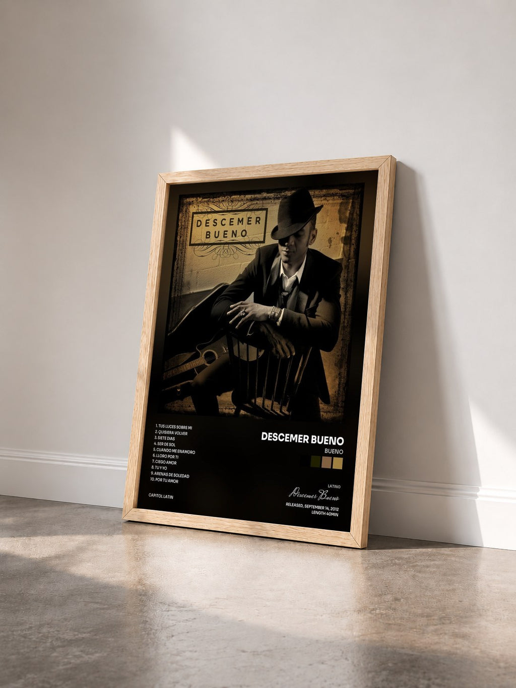 #bois Tableau de l'album Bueno de Descemer Bueno vu de trois quarts, cadre en bois brut