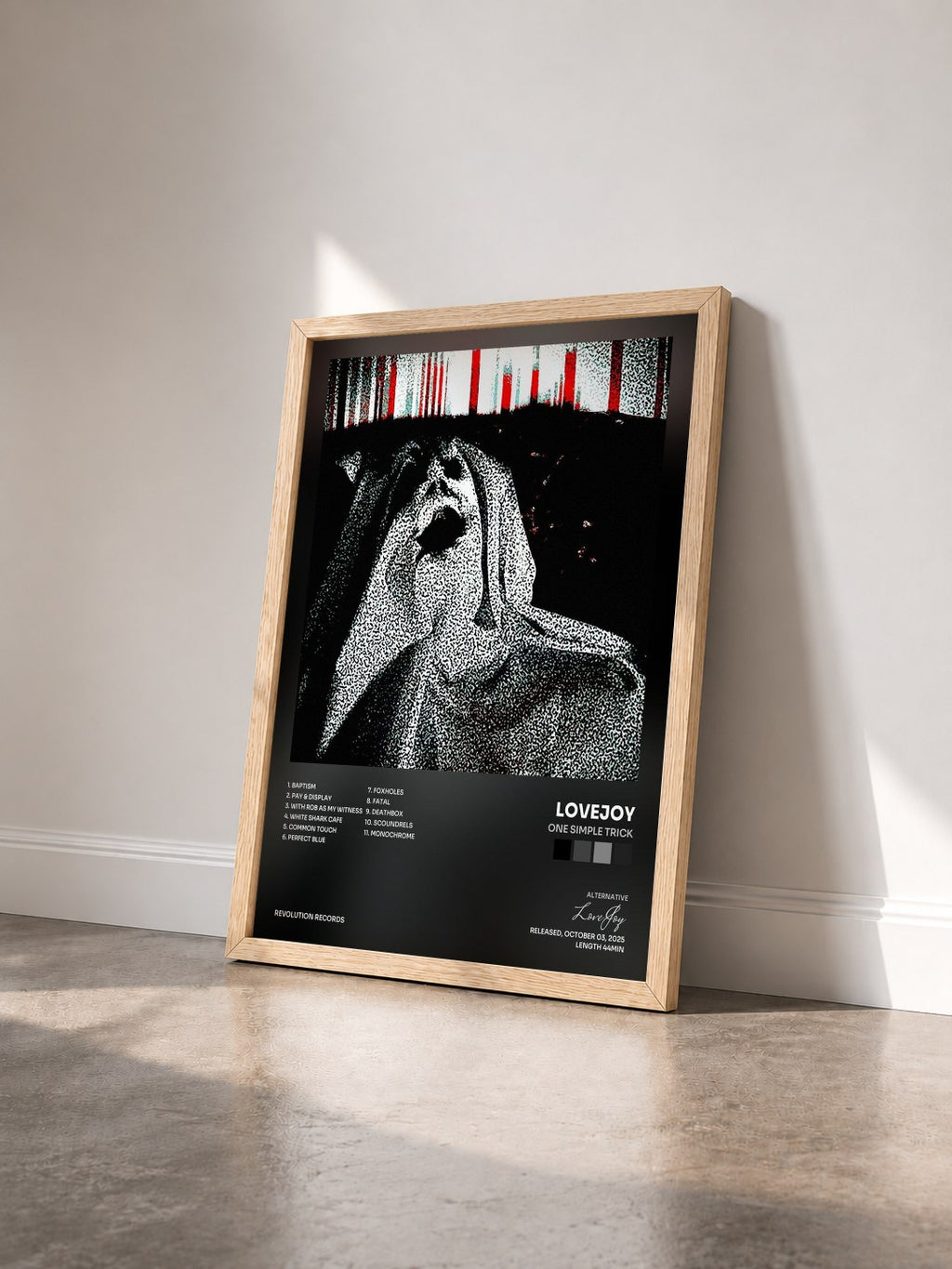#bois Tableau de l'album One Simple Trick de LoveJoy vu de trois quarts, cadre en bois brut