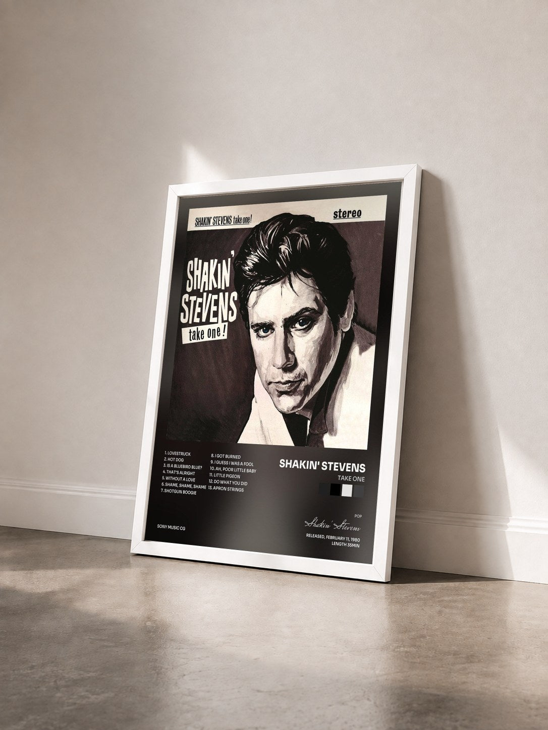 #blanc Tableau de l'album Take One de Shakin' Stevens vu de trois quarts, cadre blanc