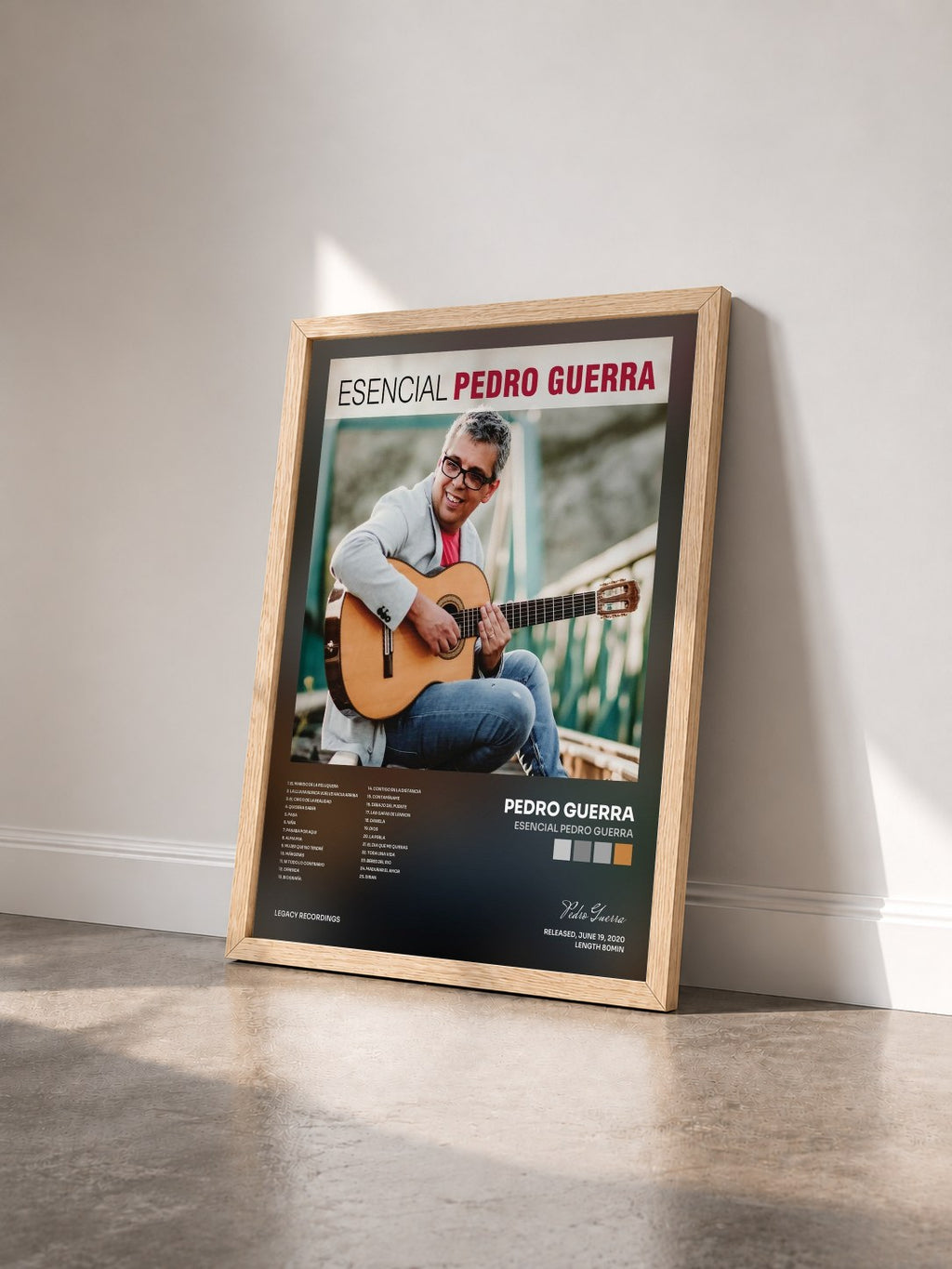 #bois Tableau de l'album Esencial Pedro Guerra de Pedro Guerra vu de trois quarts, cadre en bois brut