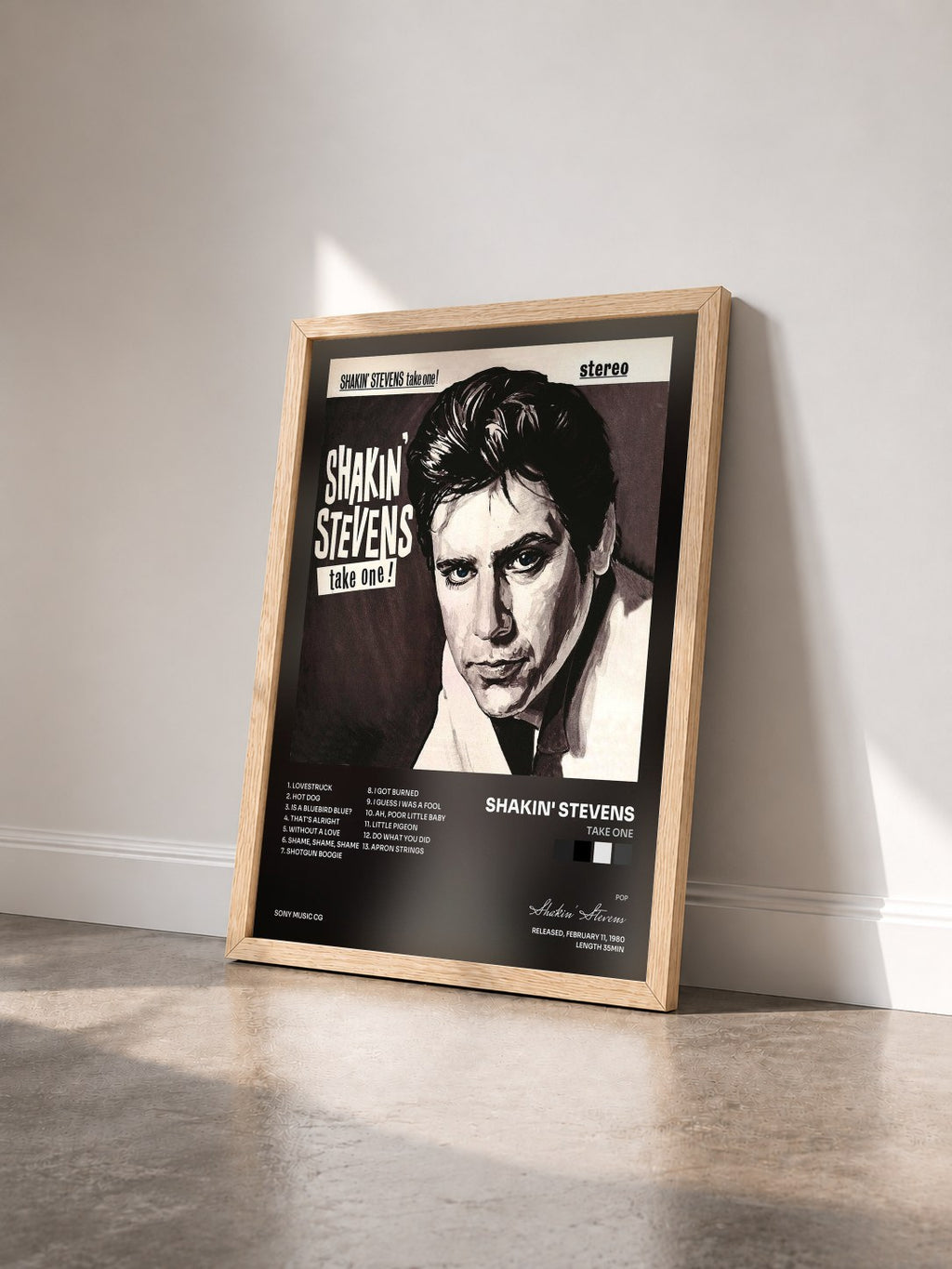 #bois Tableau de l'album Take One de Shakin' Stevens vu de trois quarts, cadre en bois brut