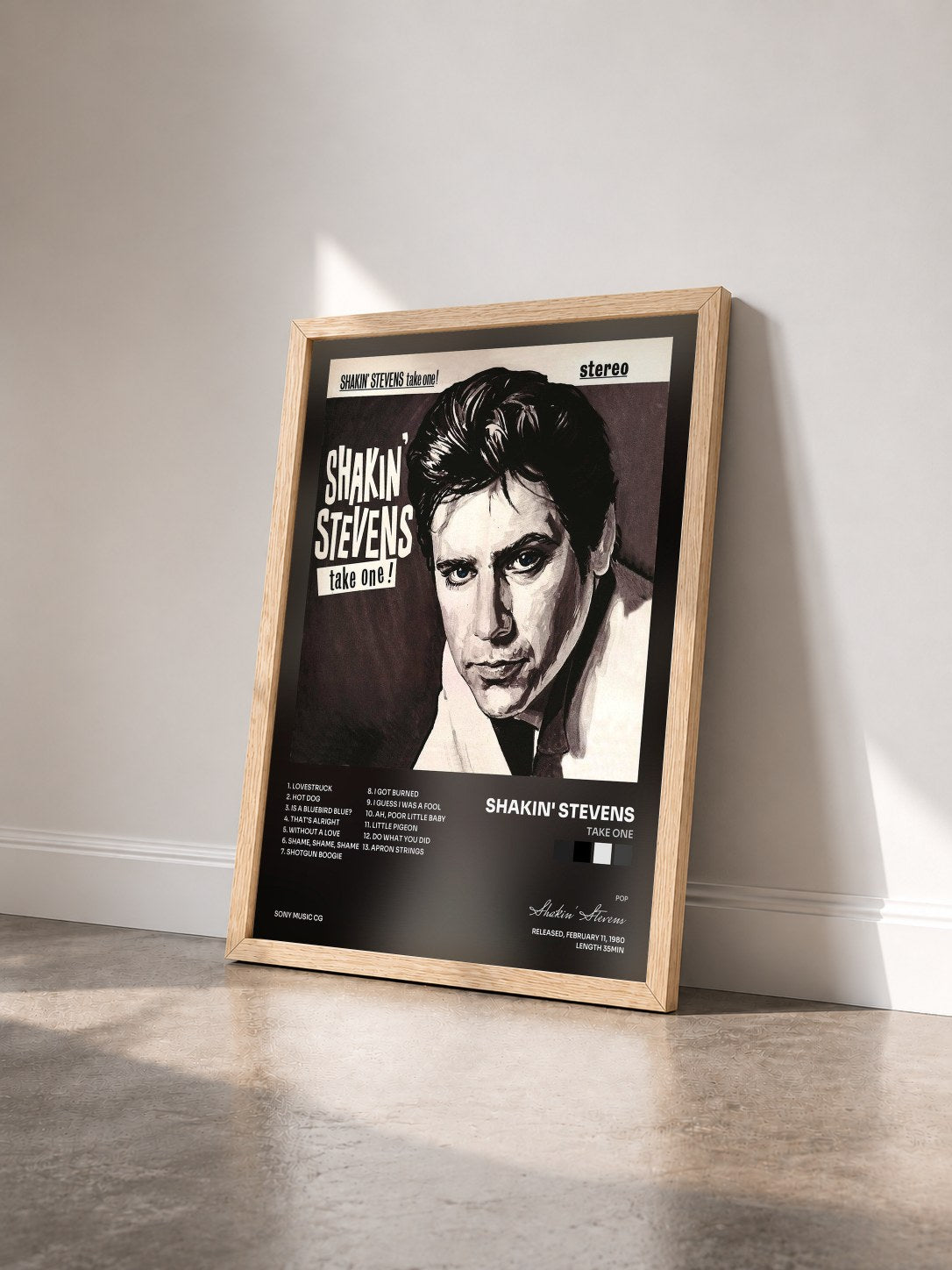 #bois Tableau de l'album Take One de Shakin' Stevens vu de trois quarts, cadre en bois brut