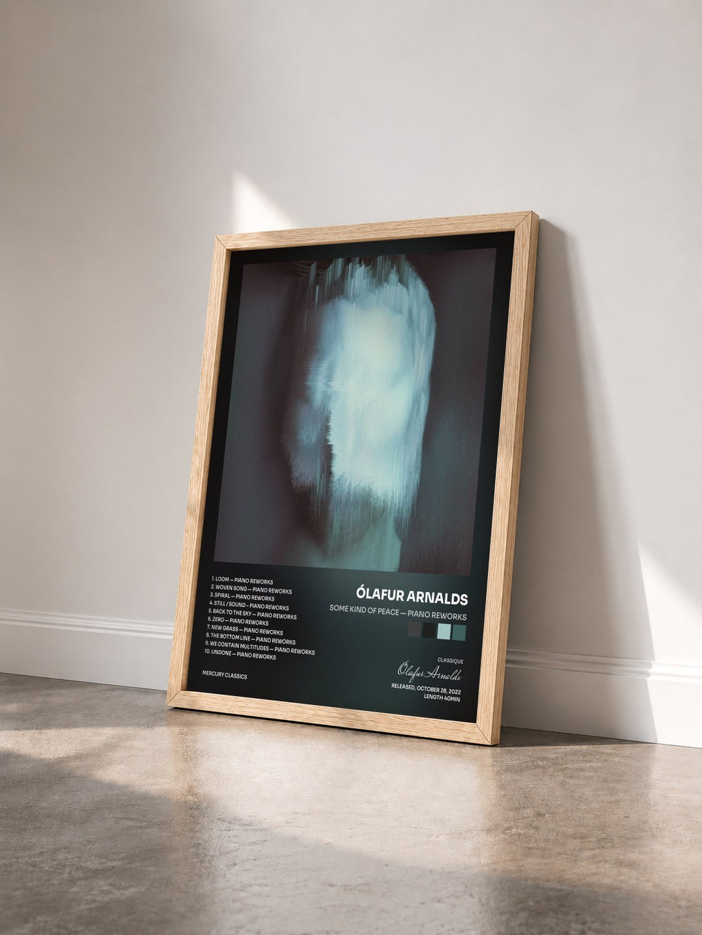 #bois Tableau de l'album some kind of peace — piano reworks de Ólafur Arnalds vu de trois quarts, cadre en bois brut