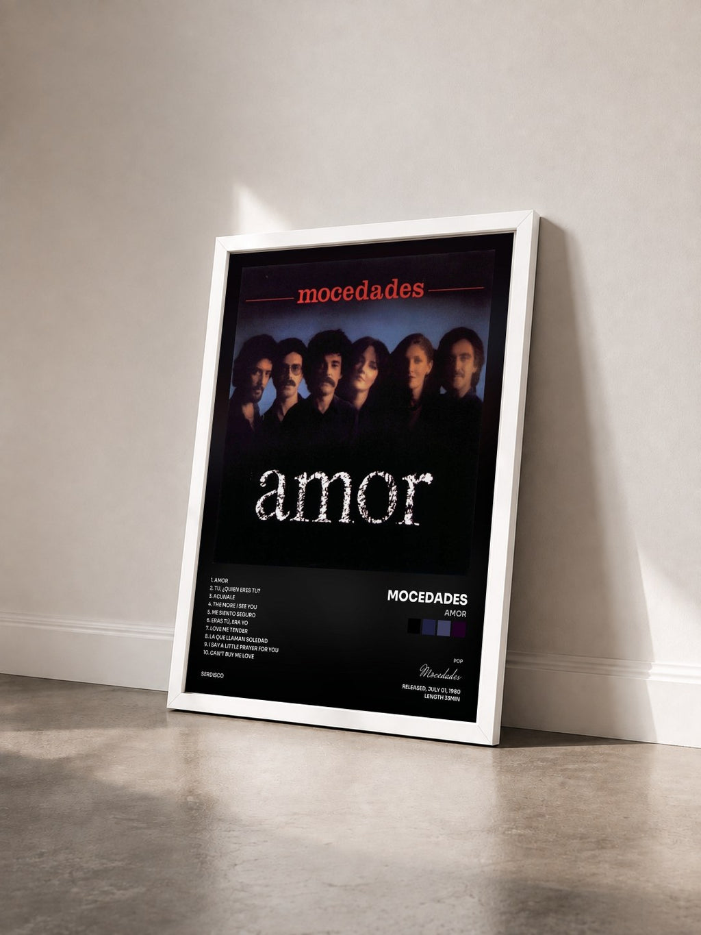 #blanc Tableau de l'album Amor de Mocedades vu de trois quarts, cadre blanc