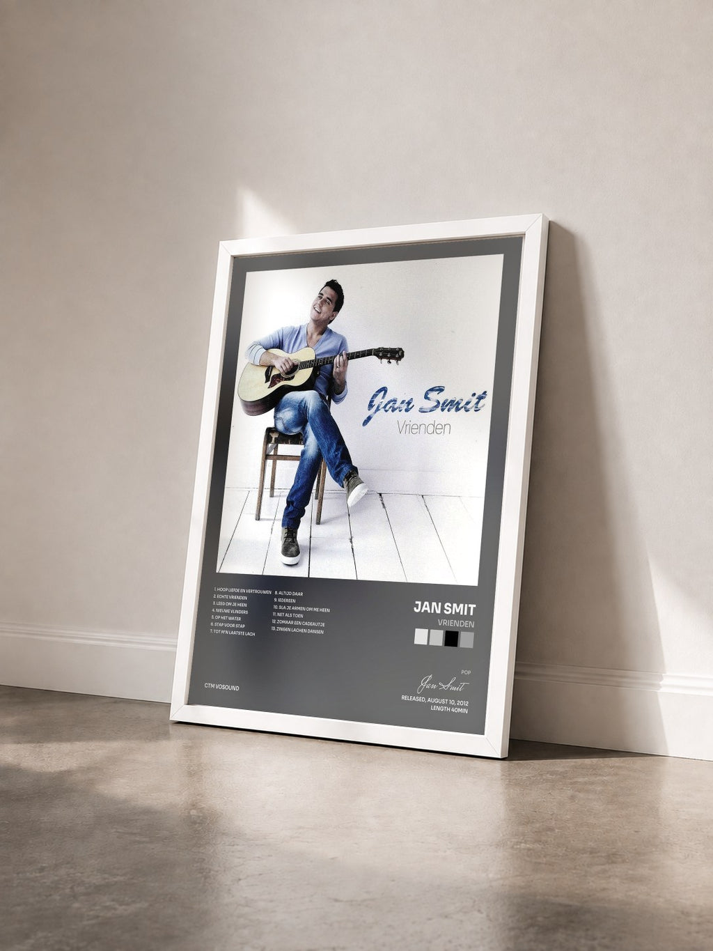 #blanc Tableau de l'album Vrienden de Jan Smit vu de trois quarts, cadre blanc