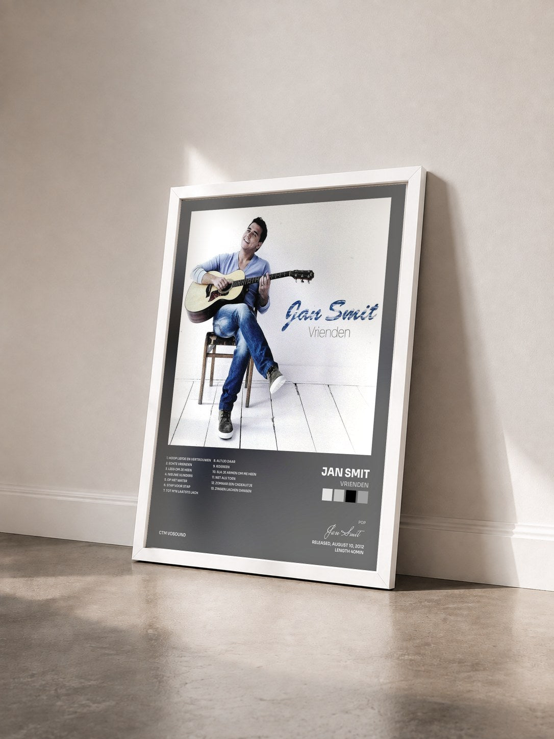 #blanc Tableau de l'album Vrienden de Jan Smit vu de trois quarts, cadre blanc