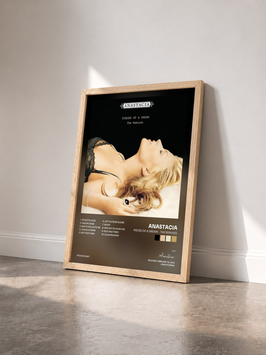 #bois Tableau de l'album Pieces of A Dream - The Remixes de Anastacia vu de trois quarts, cadre en bois brut