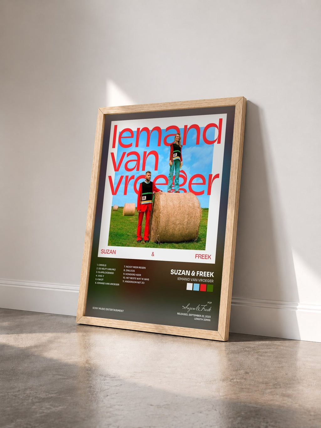 #bois Tableau de l'album Iemand Van Vroeger de Suzan & Freek vu de trois quarts, cadre en bois brut
