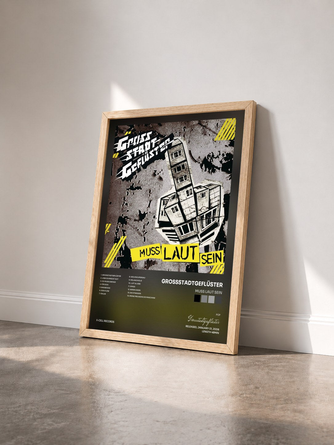 #bois Tableau de l'album Muss laut sein de Grossstadtgeflüster vu de trois quarts, cadre en bois brut