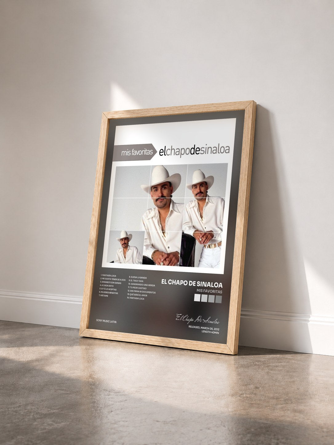 #bois Tableau de l'album Mis Favoritas de El Chapo De Sinaloa vu de trois quarts, cadre en bois brut