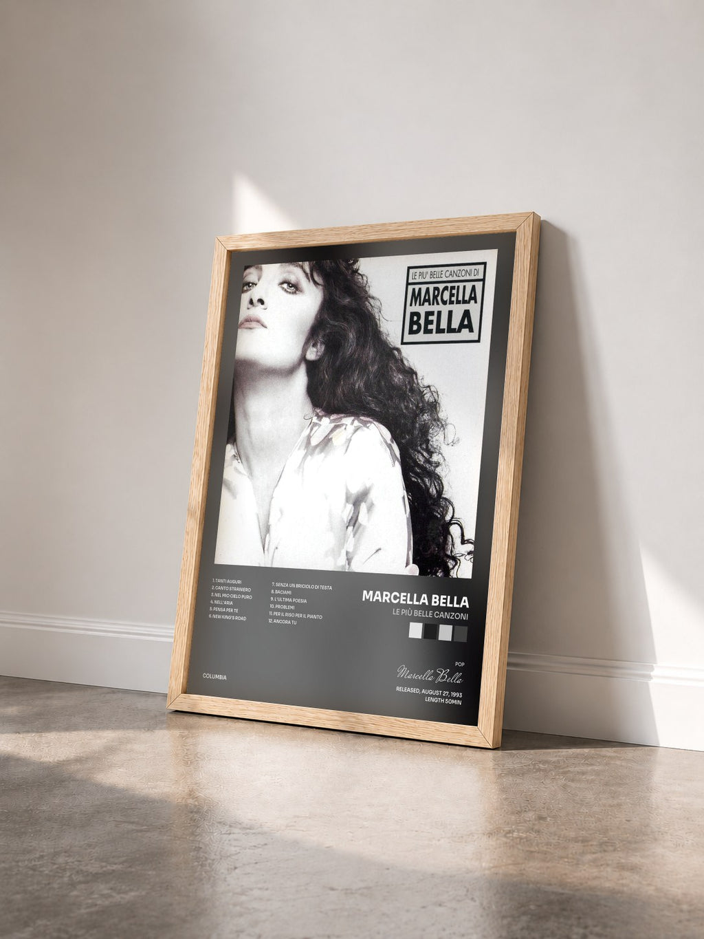 #bois Tableau de l'album Le Più Belle Canzoni de Marcella Bella vu de trois quarts, cadre en bois brut