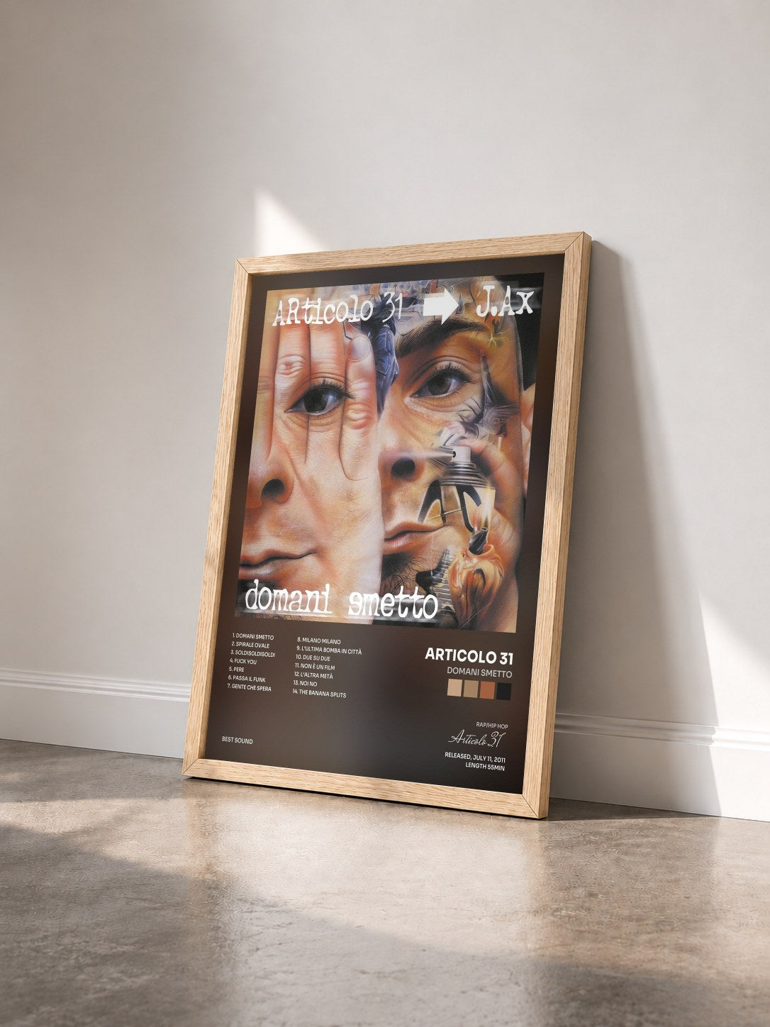 #bois Tableau de l'album Domani smetto de Articolo 31 vu de trois quarts, cadre en bois brut