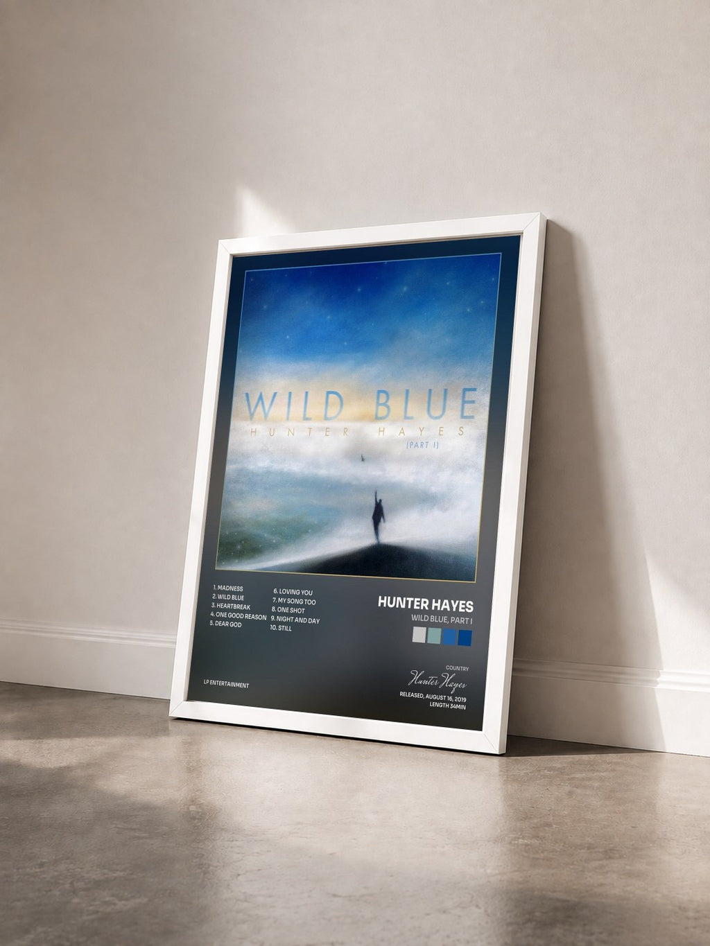 #blanc Tableau de l'album Wild Blue, Part I de Hunter Hayes vu de trois quarts, cadre blanc