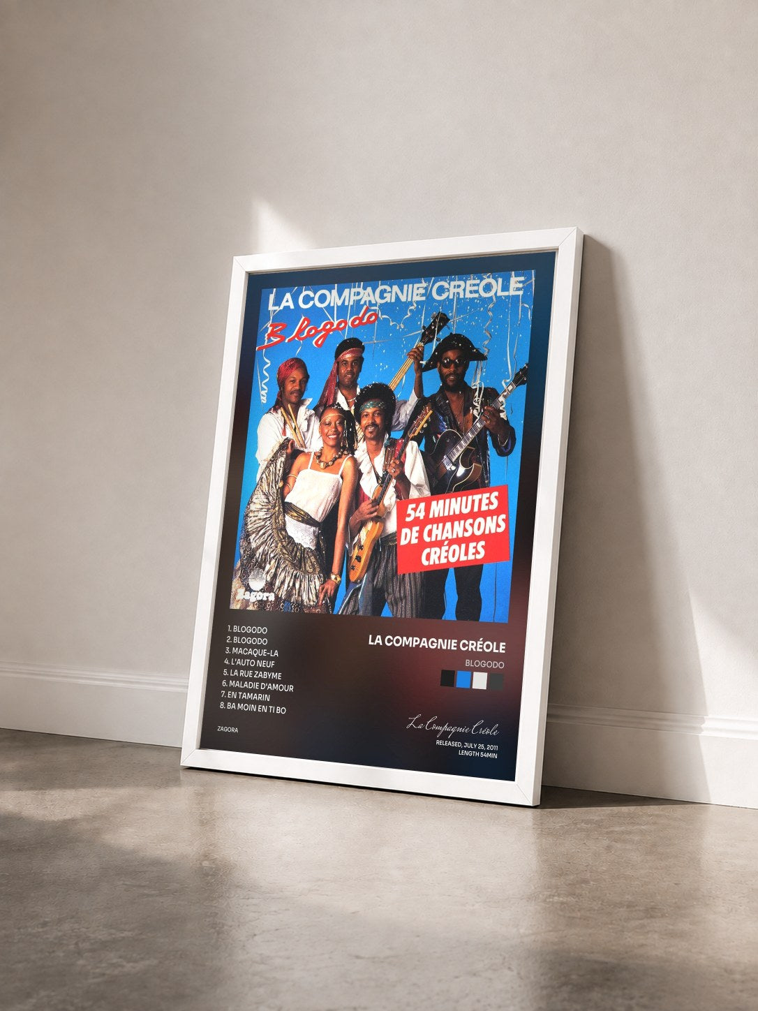 #blanc Tableau de l'album Blogodo de La Compagnie Créole vu de trois quarts, cadre blanc