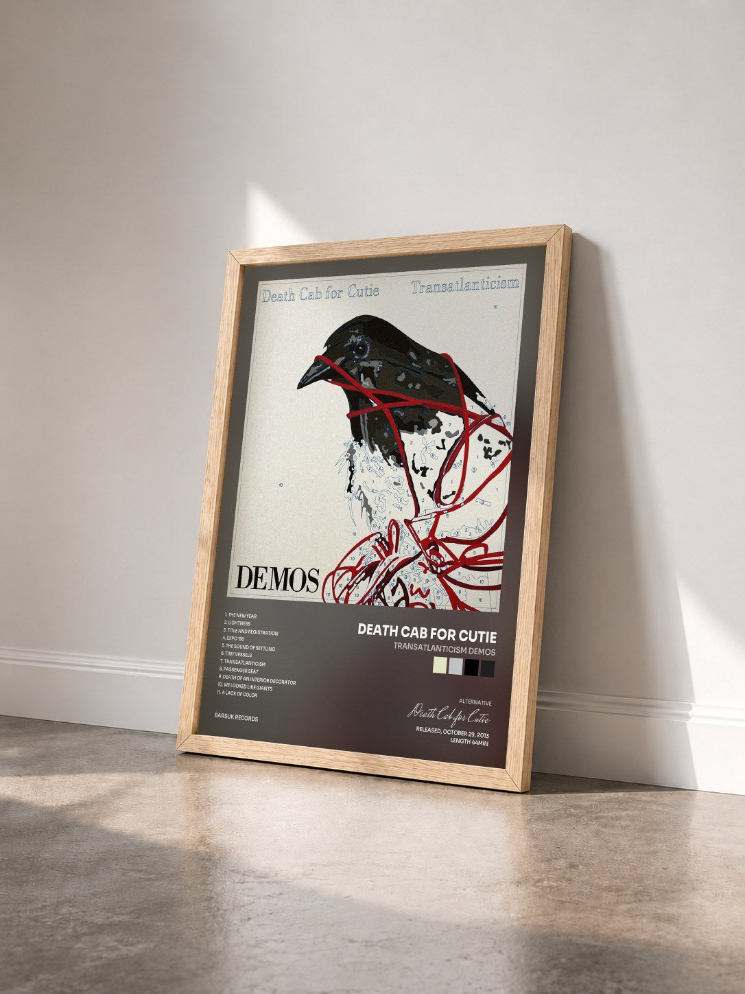 #bois Tableau de l'album Transatlanticism Demos de Death Cab for Cutie vu de trois quarts, cadre en bois brut
