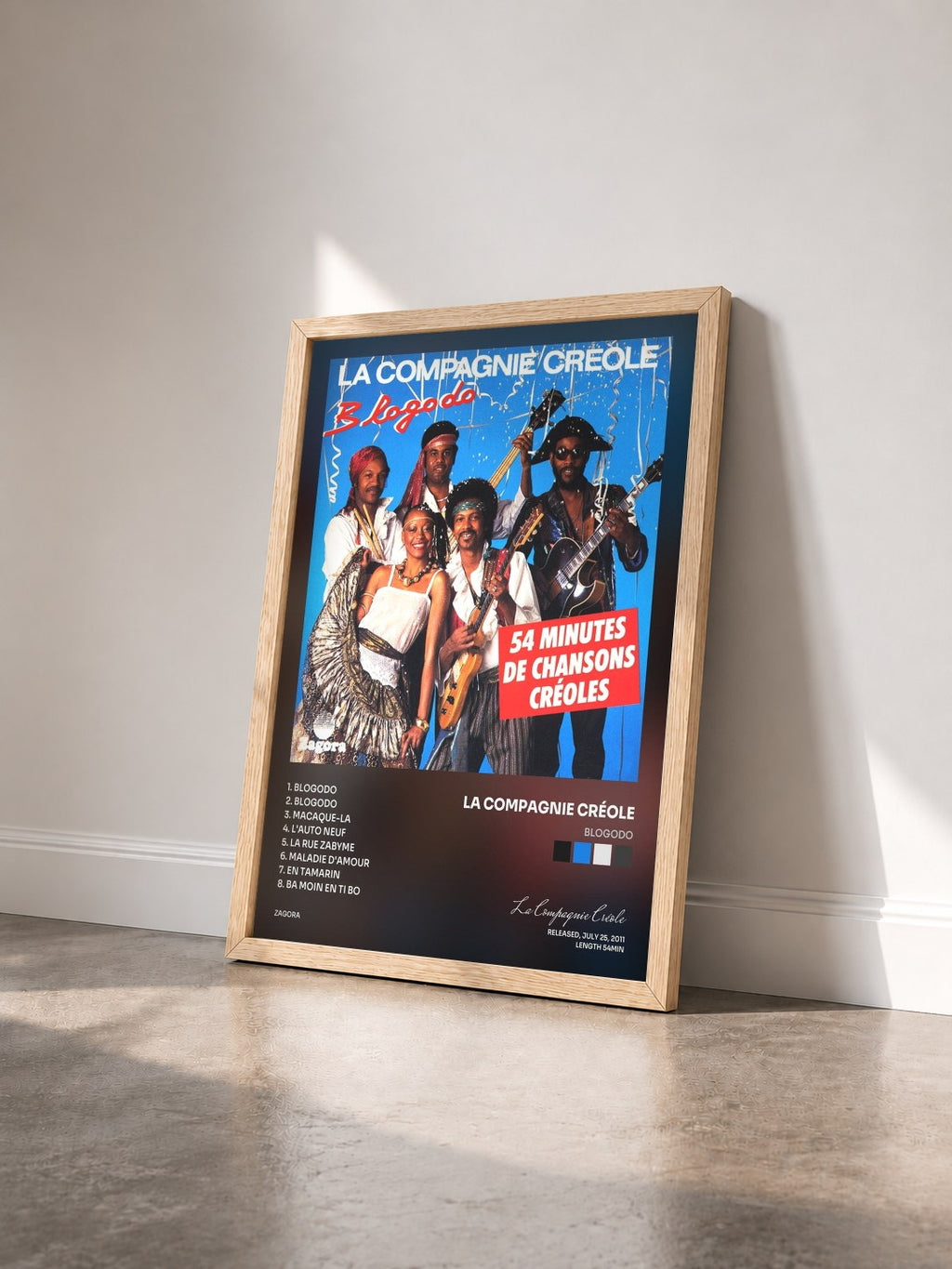 #bois Tableau de l'album Blogodo de La Compagnie Créole vu de trois quarts, cadre en bois brut