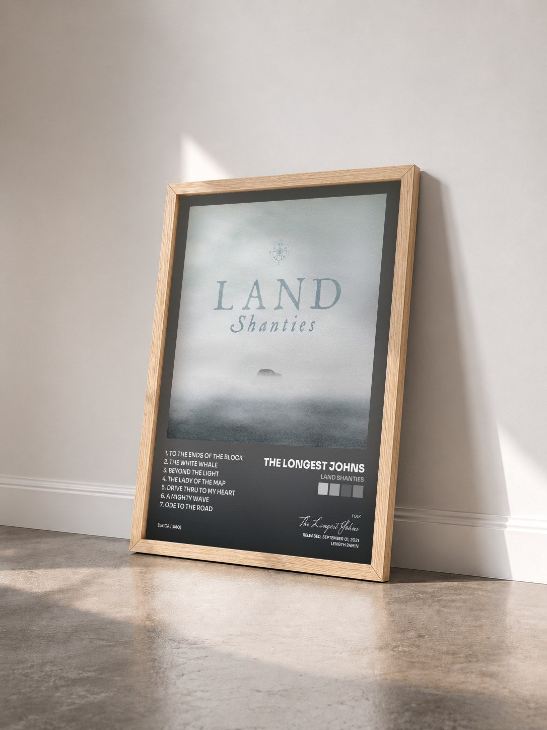 #bois Tableau de l'album Land Shanties de The Longest Johns vu de trois quarts, cadre en bois brut