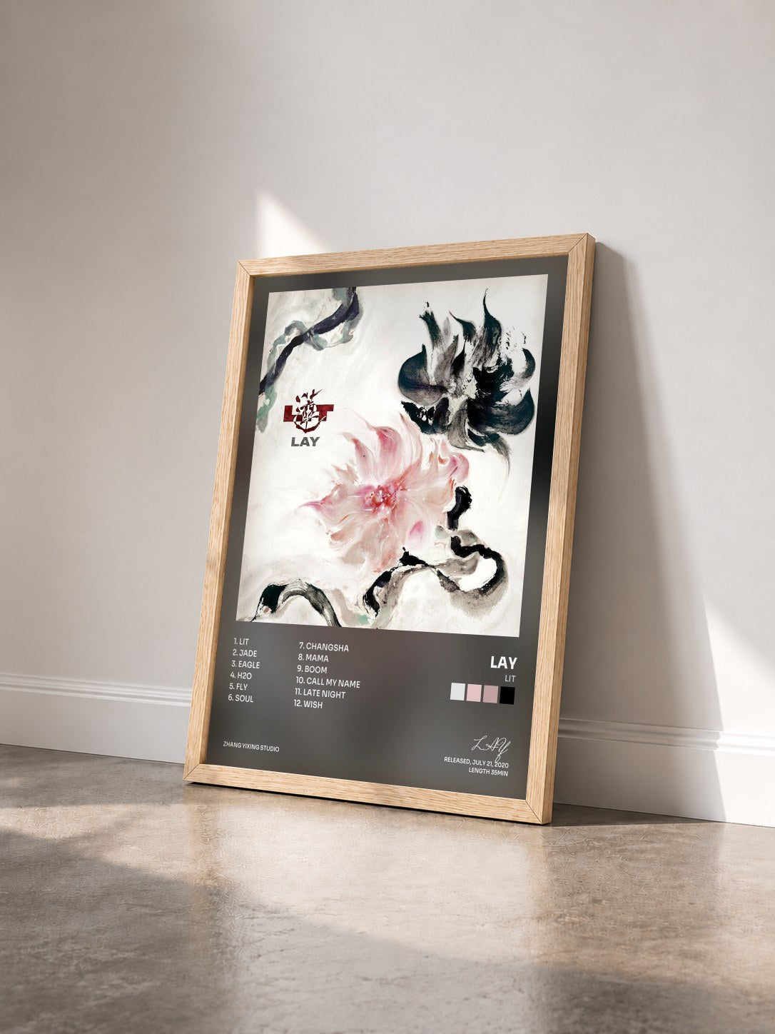 #bois Tableau de l'album LIT de LAY vu de trois quarts, cadre en bois brut