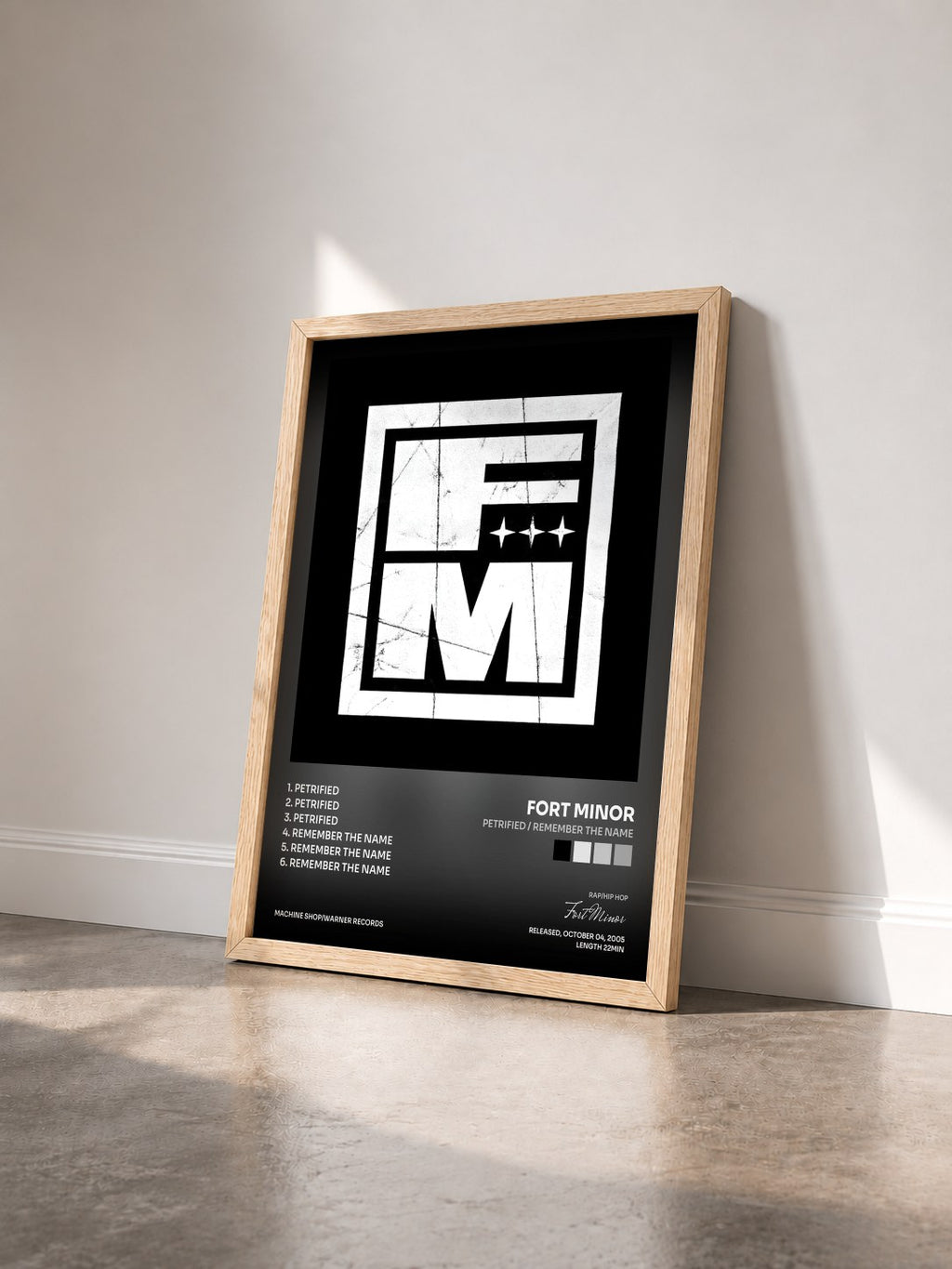#bois Tableau de l'album Petrified / Remember the Name de Fort Minor vu de trois quarts, cadre en bois brut
