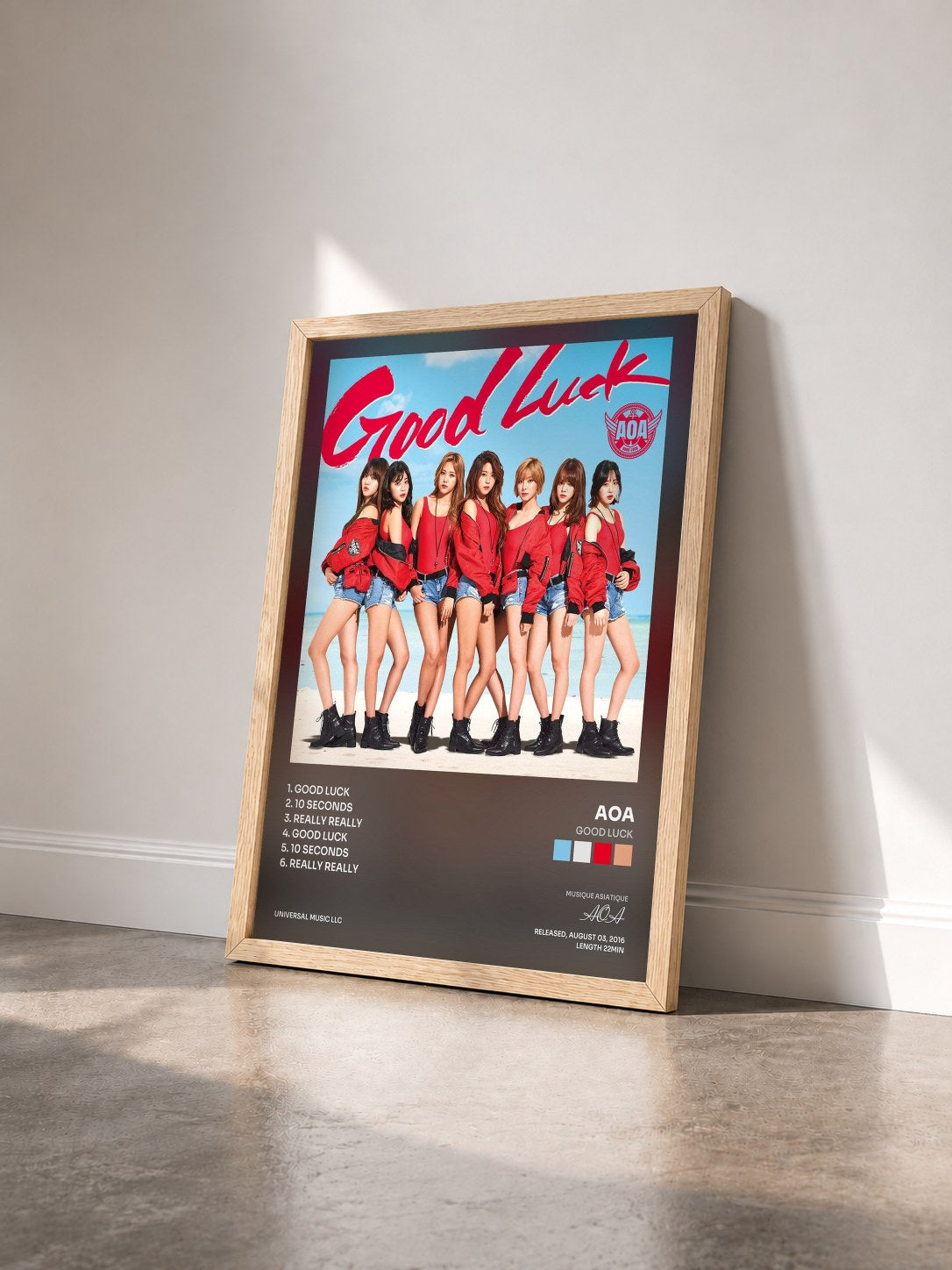 #bois Tableau de l'album Good Luck de AOA vu de trois quarts, cadre en bois brut