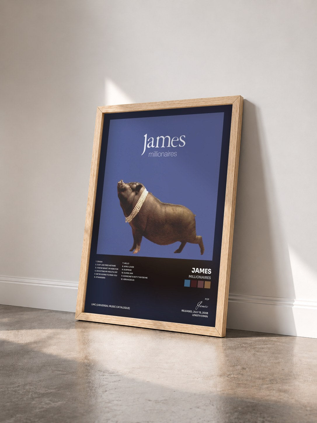 #bois Tableau de l'album Millionaires de James vu de trois quarts, cadre en bois brut