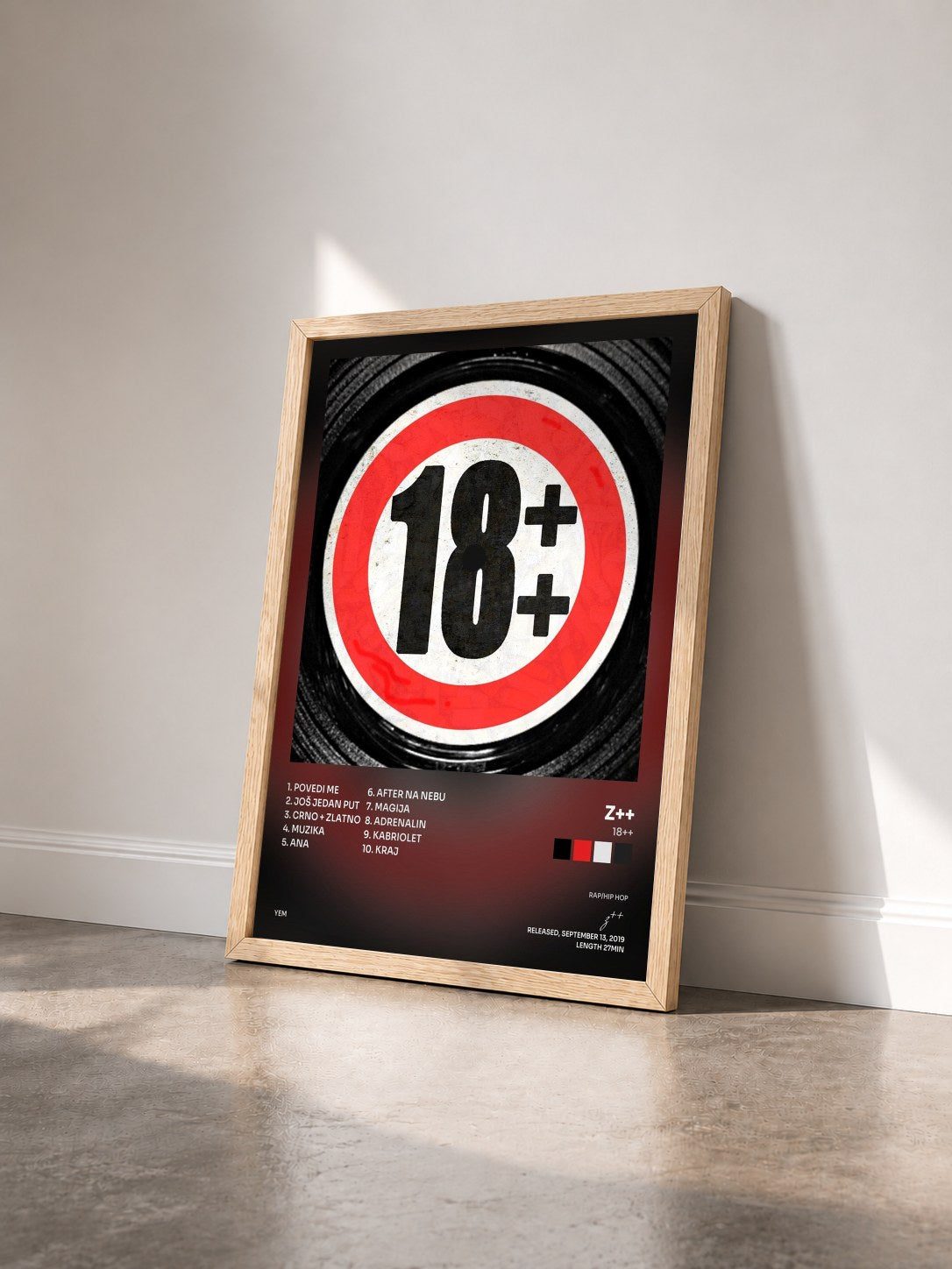 #bois Tableau de l'album 18++ de z++ vu de trois quarts, cadre en bois brut