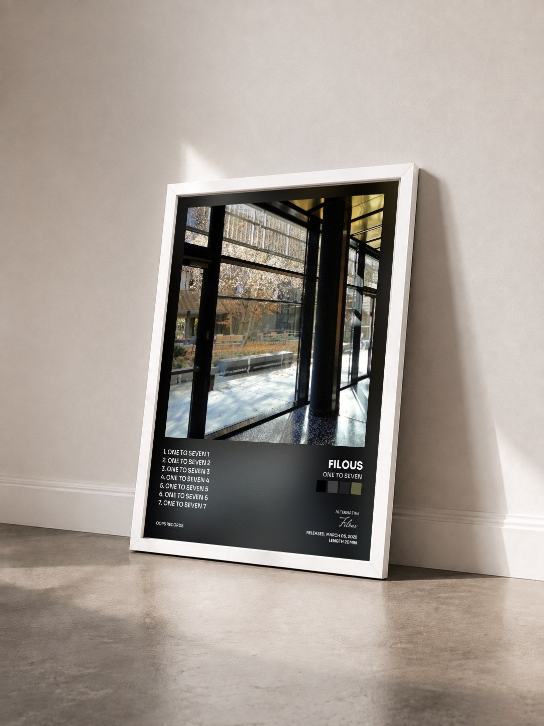 #blanc Tableau de l'album One to Seven de Filous vu de trois quarts, cadre blanc