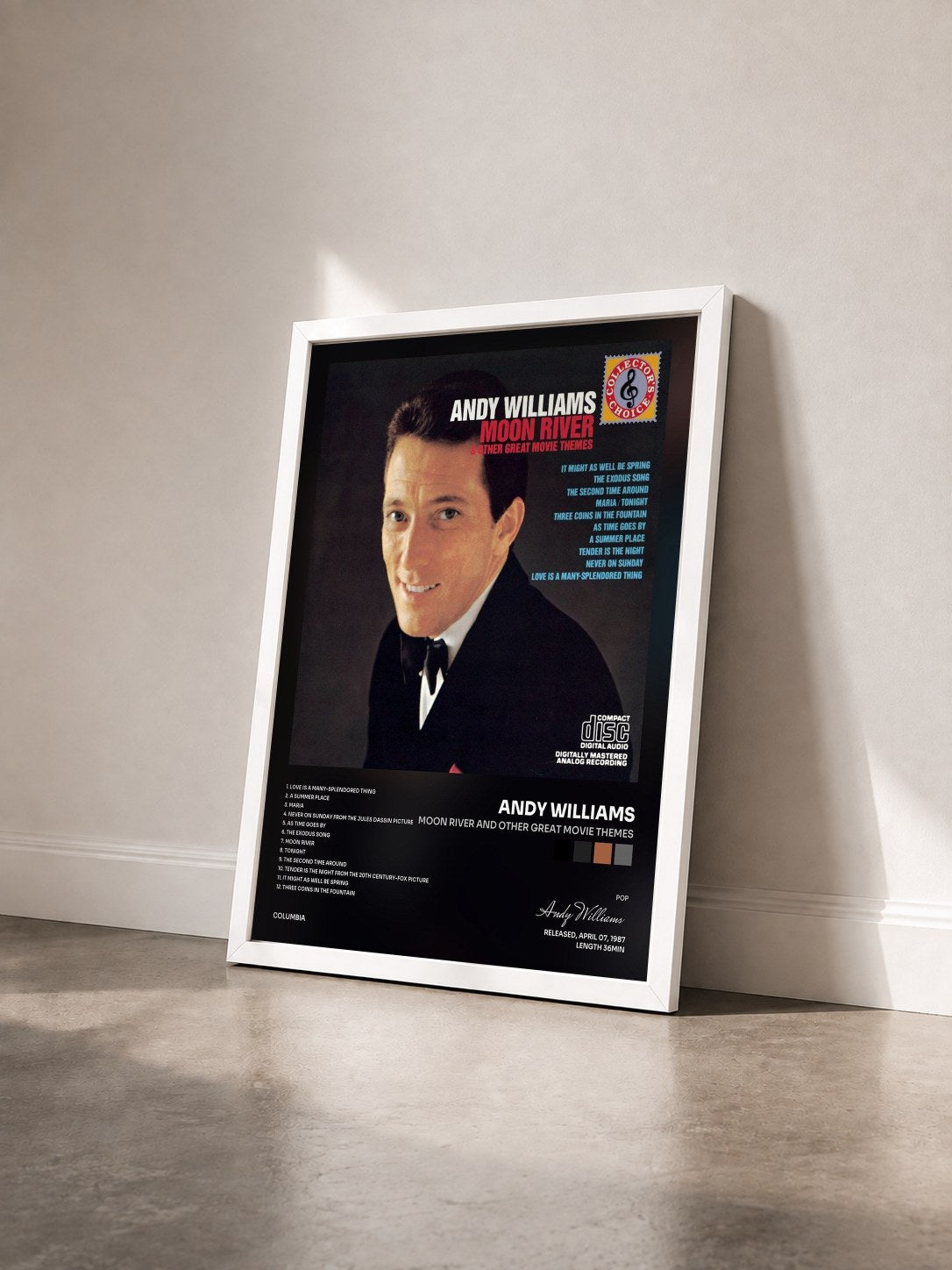 #blanc Tableau de l'album Moon River And Other Great Movie Themes de Andy Williams vu de trois quarts, cadre blanc