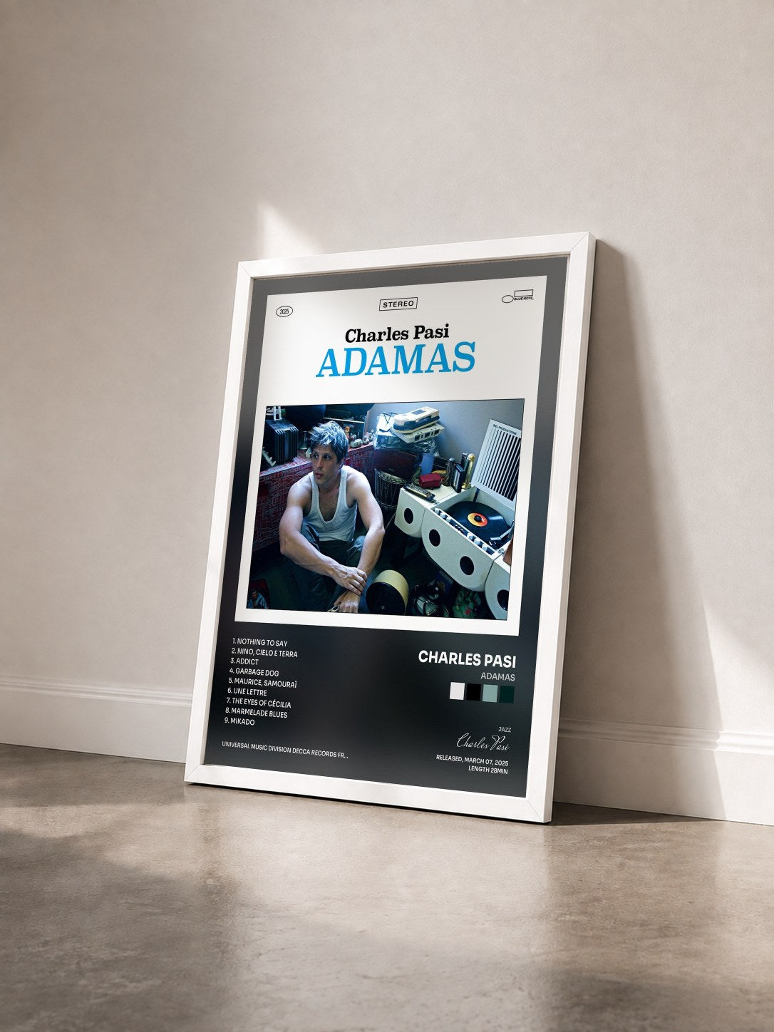 #blanc Tableau de l'album Adamas de Charles Pasi vu de trois quarts, cadre blanc