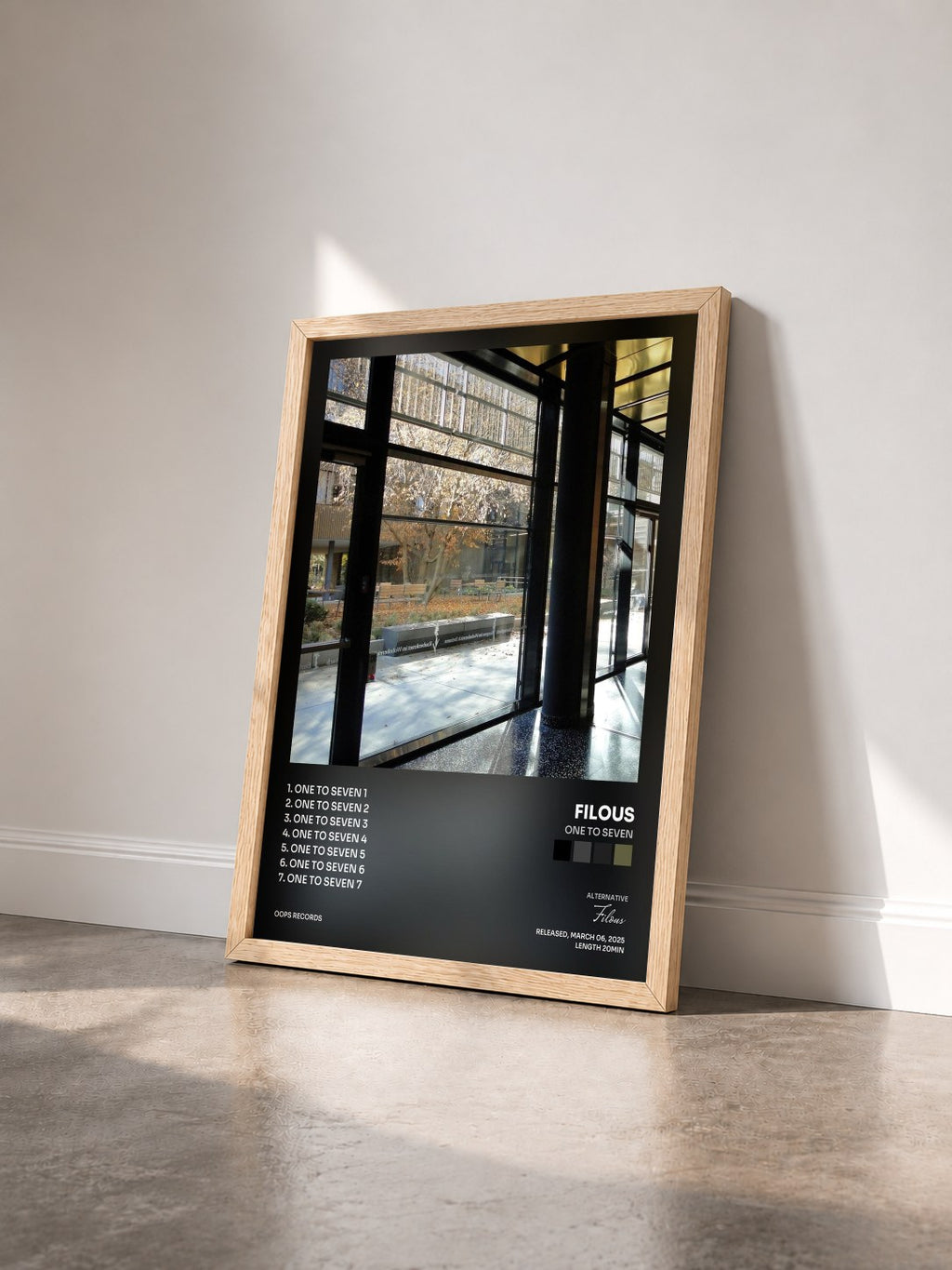 #bois Tableau de l'album One to Seven de Filous vu de trois quarts, cadre en bois brut